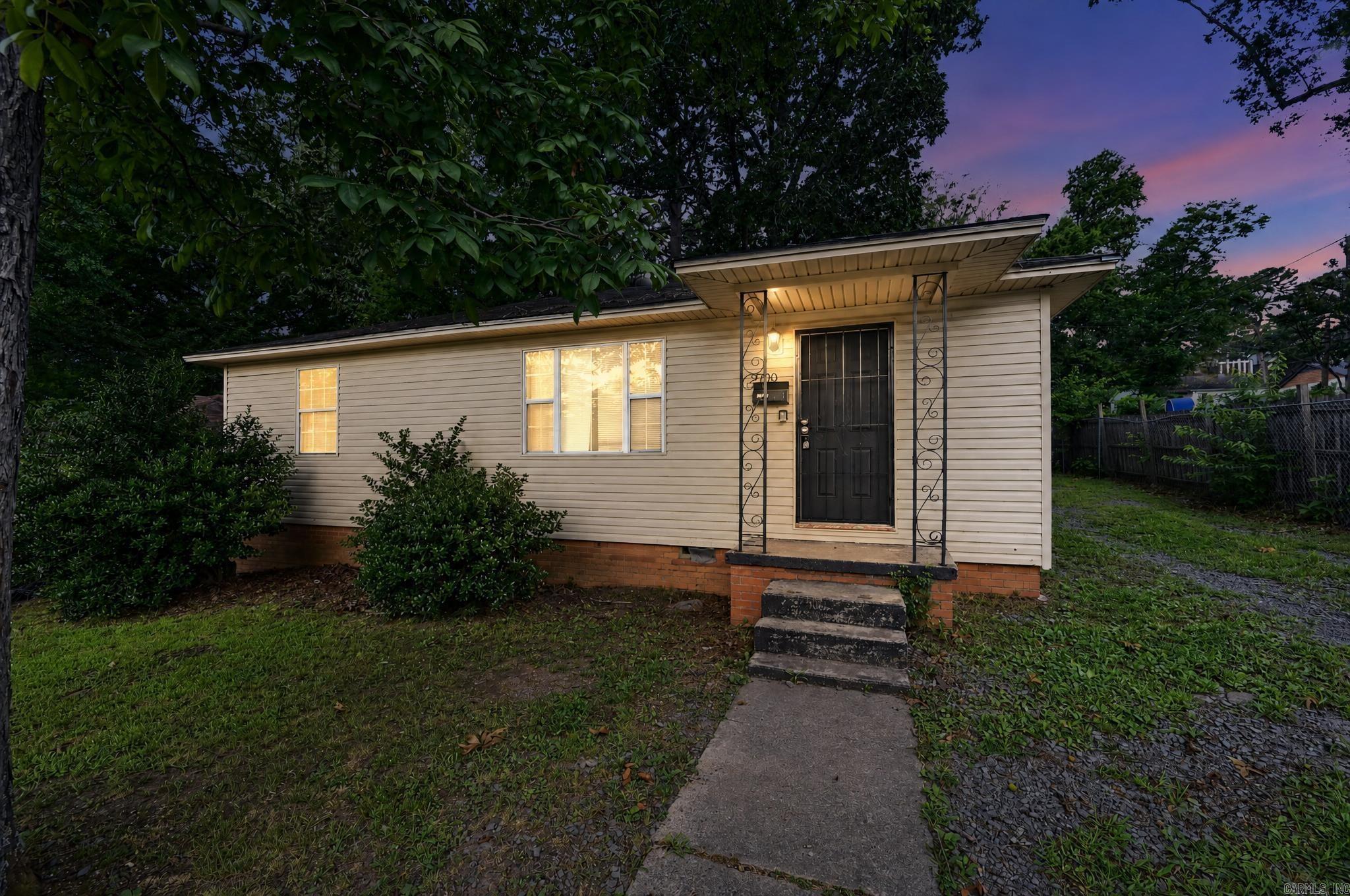 Welcome home to this charming, detached single-family ranch home perfectly situated on a spacious corner lot in the established Oak Forest subdivision of Little Rock. Boasting 1,558 square feet of comfortable living space, this property offers an ideal layout featuring three bedrooms and a well-appointed bathroom. The interior welcomes you with a functional floor plan that maximizes natural light, creating a warm and inviting atmosphere throughout the main living areas. Outside, the generous 8,712 square foot lot provides plenty of space for outdoor activities, gardening, or future entertaining setups. Location is everything, and this home delivers incredible convenience. Situated just moments away from the University of Arkansas at Little Rock (UALR), local parks, shopping, and dining, you will enjoy easy access to everything the city has to offer. With quick access to major thoroughfares like I-630, commuting across town is an absolute breeze.