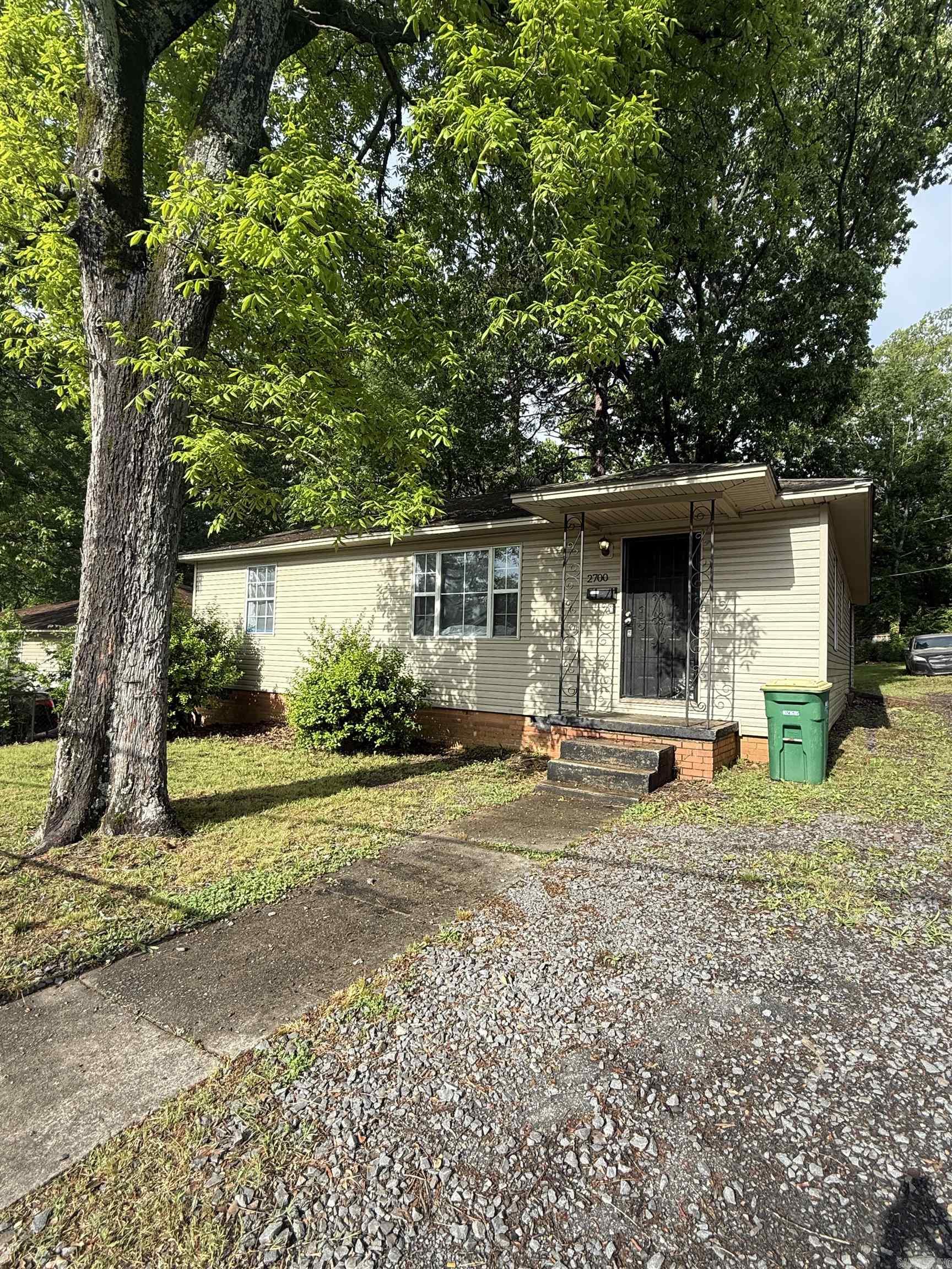 Welcome home to this charming, detached single-family ranch home perfectly situated on a spacious corner lot in the established Oak Forest subdivision of Little Rock. Boasting 1,558 square feet of comfortable living space, this property offers an ideal layout featuring three bedrooms and a well-appointed bathroom. The interior welcomes you with a functional floor plan that maximizes natural light, creating a warm and inviting atmosphere throughout the main living areas. Outside, the generous 8,712 square foot lot provides plenty of space for outdoor activities, gardening, or future entertaining setups. Location is everything, and this home delivers incredible convenience. Situated just moments away from the University of Arkansas at Little Rock (UALR), local parks, shopping, and dining, you will enjoy easy access to everything the city has to offer. With quick access to major thoroughfares like I-630, commuting across town is an absolute breeze.