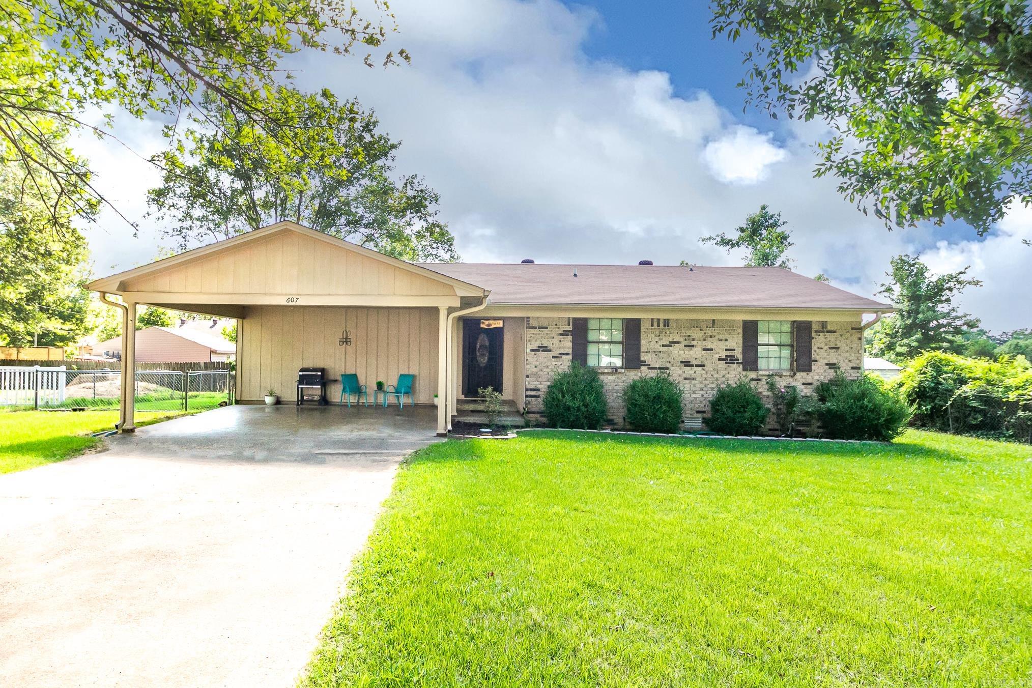 THIS IS RD ELIGIBLE, 100% financing option! Your delightful 3-bedroom, 2-bath next home is nestled on a double lot just under half an acre. You’ll adore the spacious, well-loved interior, designed for comfort and ease. Imagine relaxing in your expansive yard, perfect for weekend barbecues and family gatherings. The country feel of Beebe offers tranquility, yet you’re just a stone’s throw from restaurants and shopping, ensuring you never sacrifice convenience. With Little Rock Air Force Base only 20 miles away, your commute is a breeze, giving you more time to enjoy your beautiful home and vibrant community. Don’t miss your chance to experience the perfect blend of rural charm and modern amenities at 607 Meadow Circle – it’s not just a house, it’s your new home.