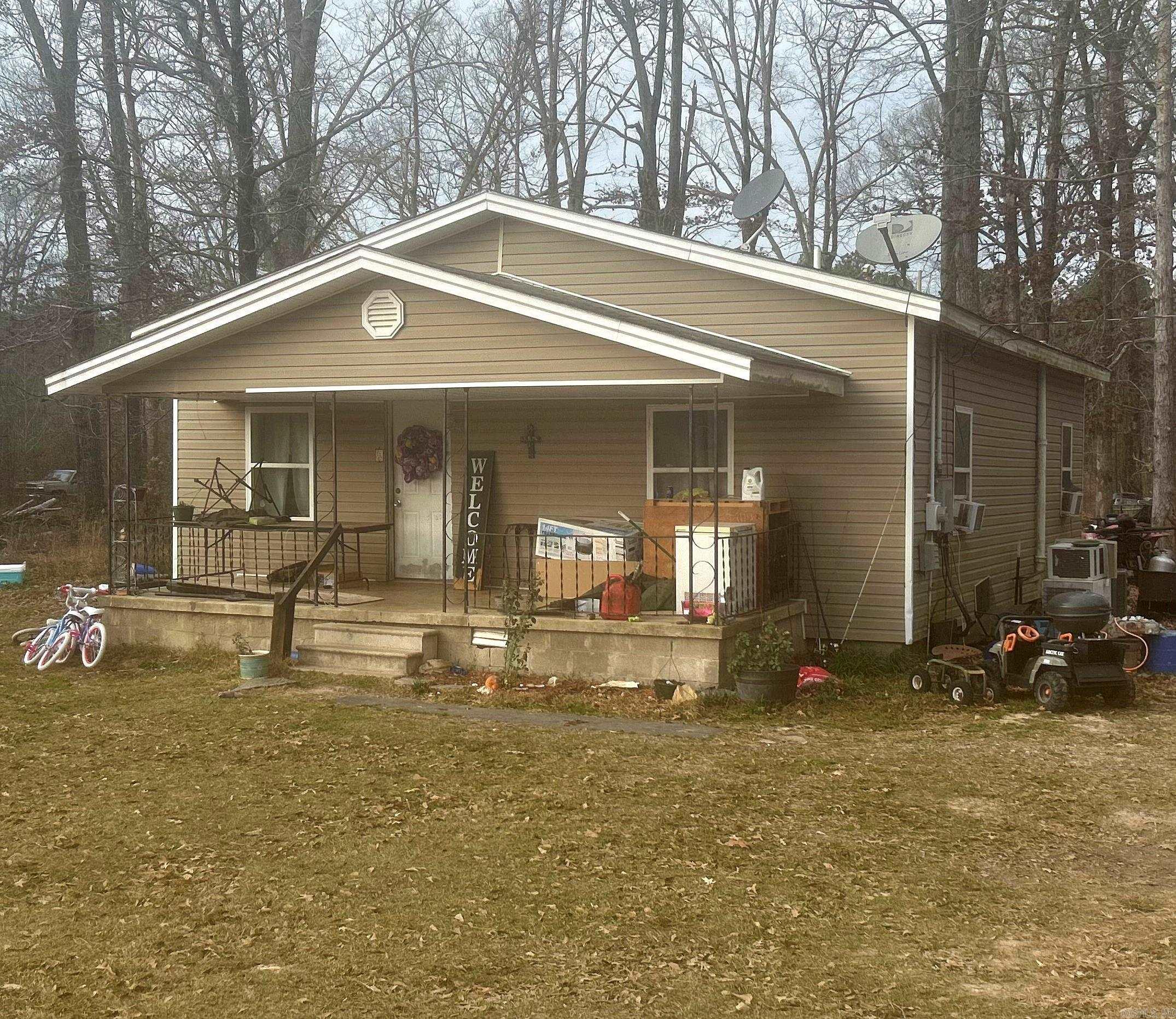 Bring your vision and tools to this country property situated on a spacious 1-acre lot. This home offers a solid opportunity for investors, renovators, or buyers looking to create their own rural retreat. With plenty of room for gardens, animals or outdoor hobbies, the land is the true highlight--open, usable, and full of potential. Enjoy peaceful country living with the freedom of space and privacy, all while being a short drive from town conveniences. Property is being sold " AS IS" and will require repairs and updates. A great chance to build equity and make it your own!