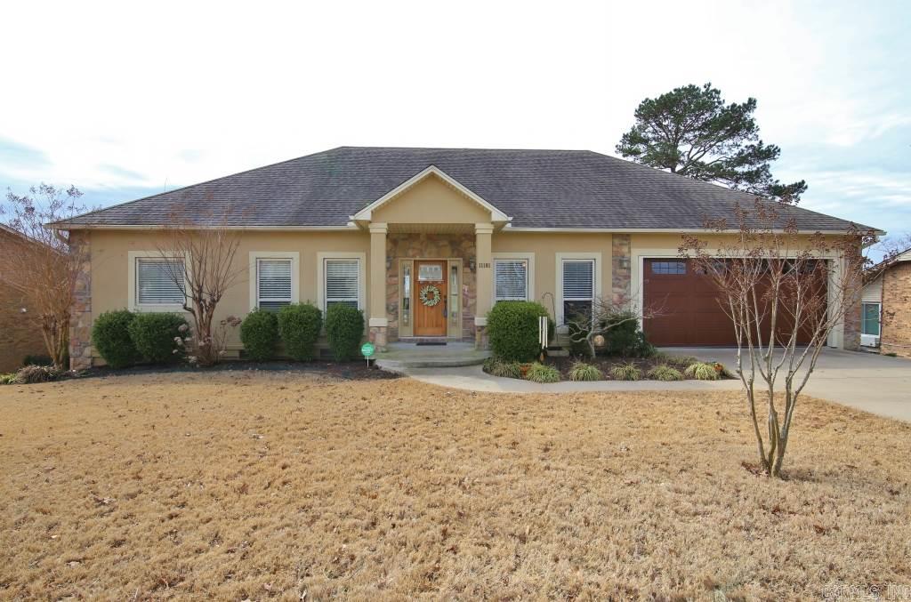 Built in 2007, this stunning home in Walton Heights boasts one of the best views in the city!  Spacious great room with tray ceilings and picture windows across the back of the house.  Master Suite with his/hers closets, separate vanities, jetted tub and walk in shower.  Add'l guest on main level with hall bathroom.  Downstairs 2 split bedrooms with den and hall bath with double vanity.  Fenced flat yard & tiered decks!  Tranquility in the center of town!  Truly a must see for the home and spectacular view!