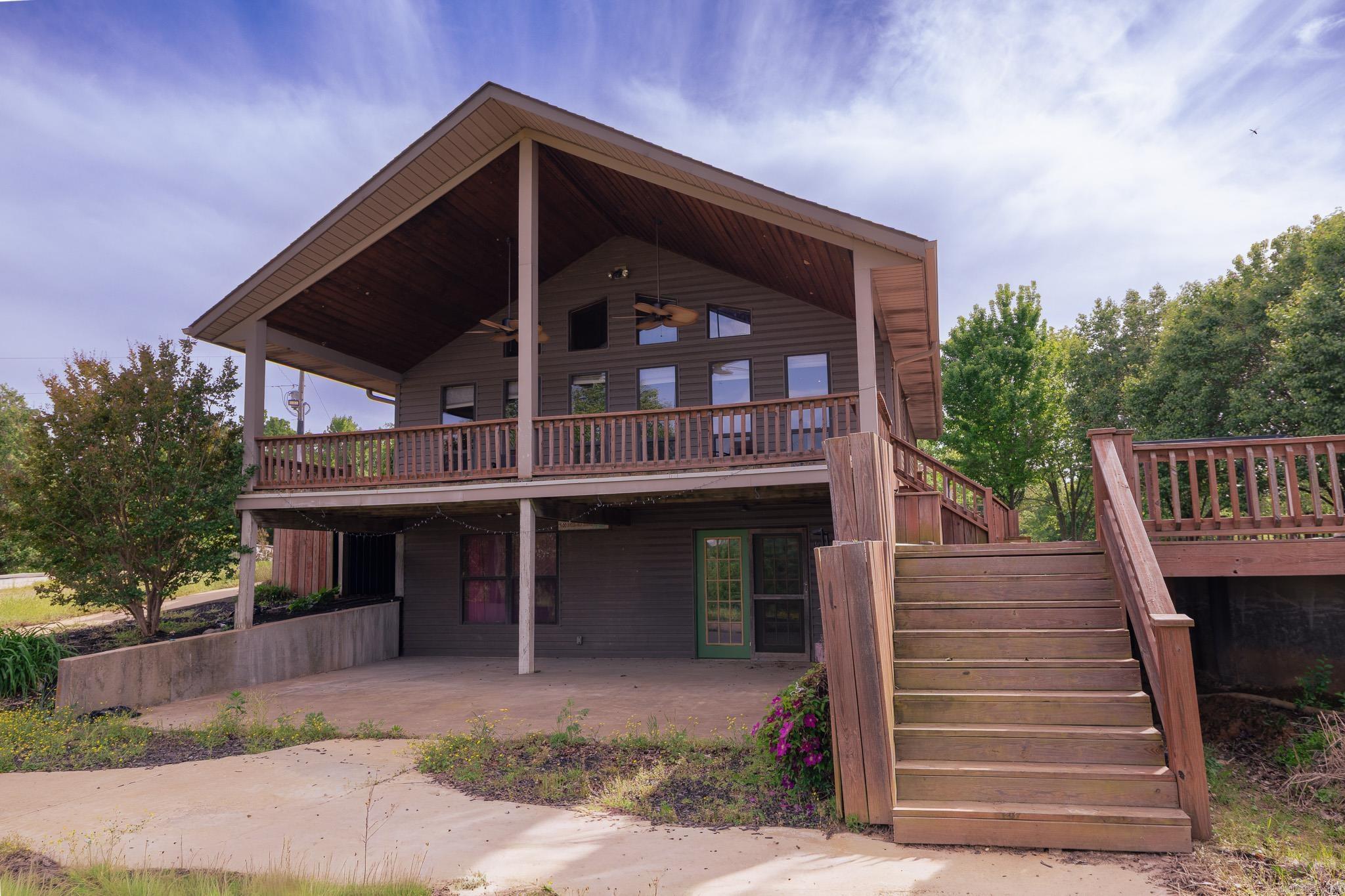 This 280 +/- acre spread offers the perfect blend of functionality. beauty, and income potential- all in one property.  The centerpiece is a charming A-frame home thats unique and practical, boasting 3 bedroom 2 bath with bonus rooms and oversized laundry room.  Step outside to a beautiful deck overlooking a million-dollar view, complete with a pool- perfect for relaxing after a long day on the farmer entertaining guests.  This property is fenced and cattle-ready, set up and ready to go from day one.  You'll also find:  Multiple ponds, Large barn with electric and water, open pasture mixed with wooded areas for versatility, and has an excellent layout for farming, ranching or recreational use! Whether you're looking to run cattle, invest in land, or just enjoy wide-open space with incredible views- this property checks all the boxes!