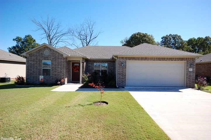Like New home in Orchard Hollow Phase III,custom features throughout,crown molding,tray ceilings,tumbled stone back splash in kitchen,pantry,under counter task lighting,ceramic floor,GE appliances throughout,built in microwave/vent hood.  Master has luxurious bathroom,double cultured marble vanity,large walk in closet w/built in shelving.Home is sodded, includes ceiling fans in all rooms,ceiling fan decorative medallions,gutter,& school is just around the corner!! Refrigerator and Washer/Dryer set negotiabl