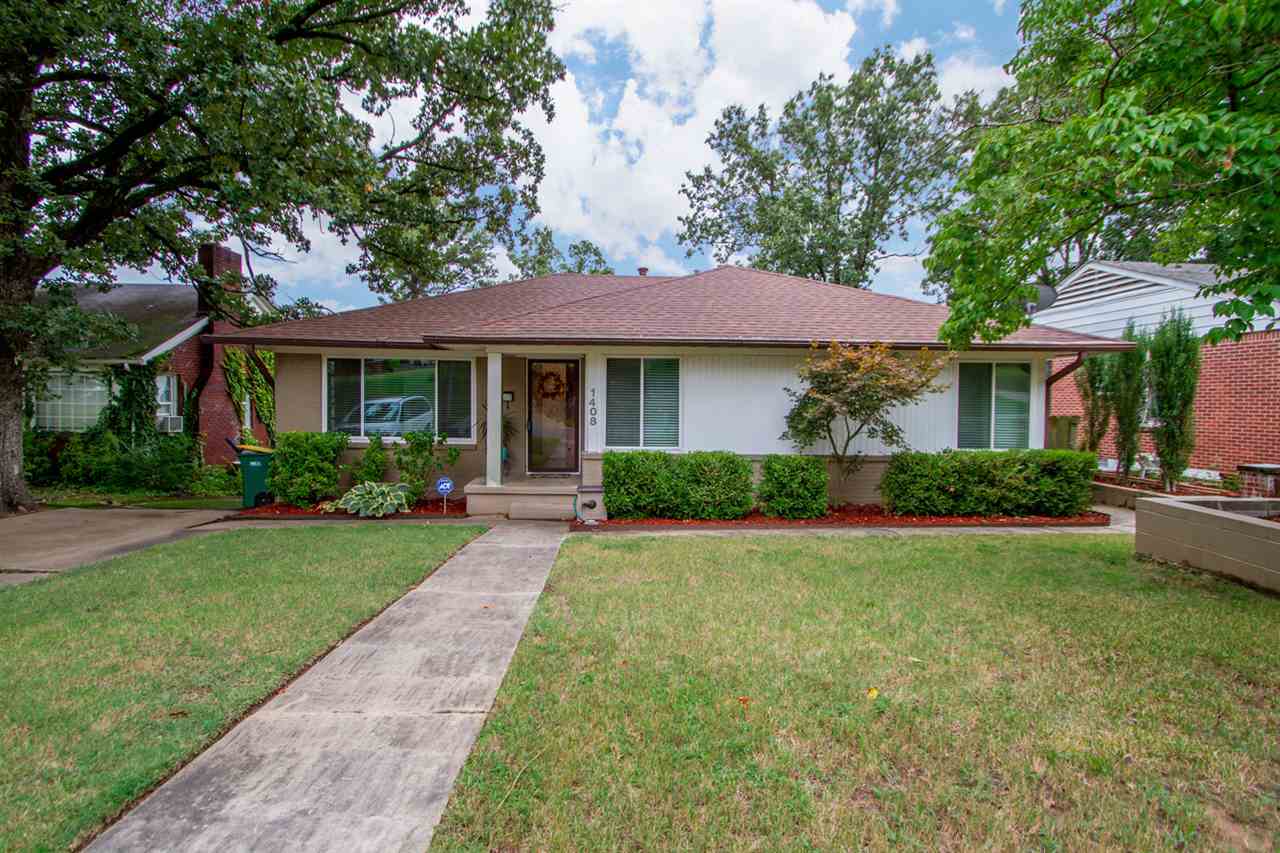 Perfectly Park Hill!! This is a beautifully remodeled & undated house with a VIEW OF DOWNTOWN! 4 bedrooms, 3 on main level & 1 down. 2 full baths. Beautifully refinished hardwood floors. Updated kitchen, nice and roomy w/ a wine cooler! Large dining room w/built-in china cabinet and large widows! 2 living areas, one up & one down. Down stairs living area has a wet bar. Large Laundry room! New roof! Custom blinds! Stained concrete down! Under house storage! City View!! *agents see remarks for additional info