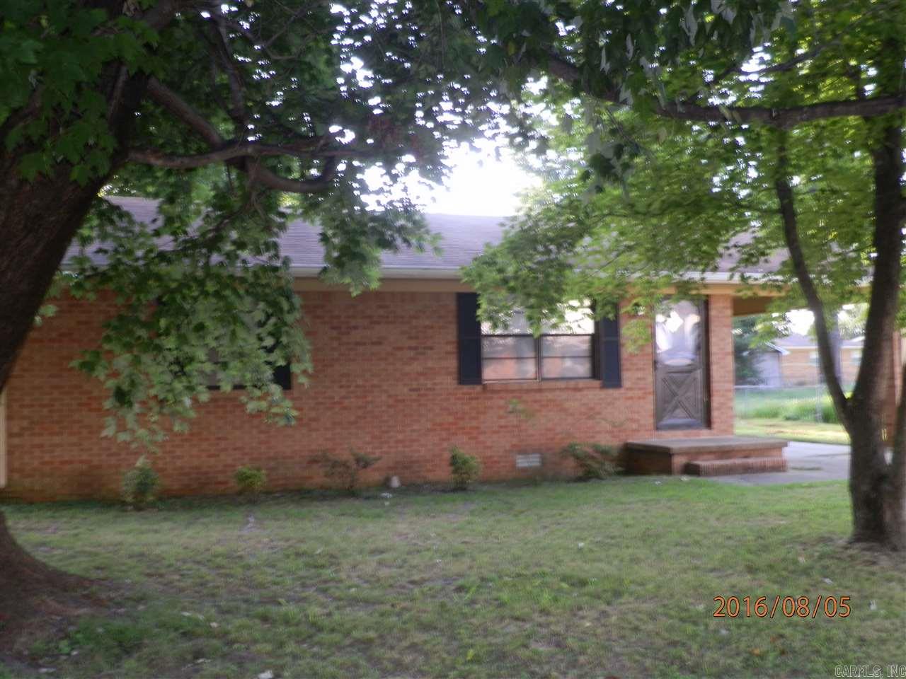 Nice brick house with large, partially fenced back yard. Eat-in kitchen is open to living room. Two good sized bedrooms. Bathroom has walk-in shower. Separate laundry room. Apply with Property Manager. Application fee charged.
