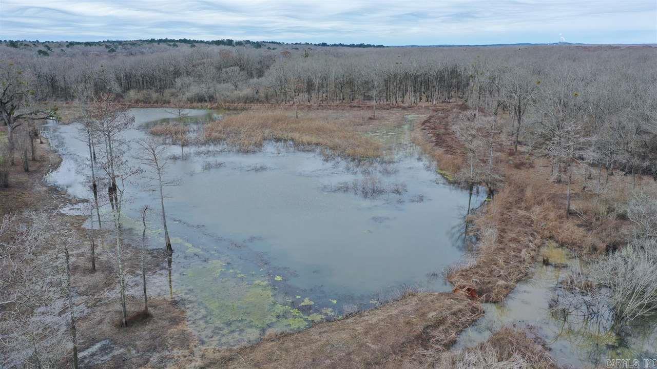 This unique hunting property joins Sulphur River and almost 18,000 acres of Wildlife Management Area. Features include a private concrete boat ramp, fishing pier, duck sloughs and more! Really hard to put into words everything that this outdoorsmans paradise has to offer.