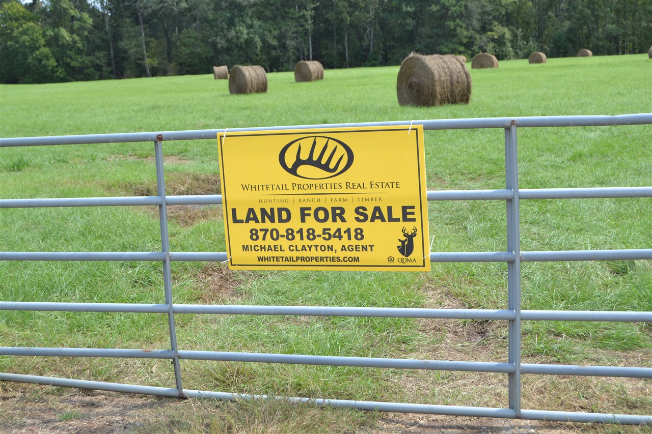 Welcome to the land of tall pines and pink tomatoes. The laid back lifestyle of the south is nowhere more evident than here. The Highway 63 tract is a beautiful, ready for new construction, hobby farm or family homestead. The lush Bahia grass hay meadow produces ample winter feed for livestock while the pasture provides summer grazing. The timber stands offer quality habitat for local wildlife such as whitetail deer, turkey, hog and small game as well as loafing ground for the livestock. The small pond provides year round water as well as opportunities for fishing. The timber stands hold several locations for food plots and stand sites and ample timber volume to produce immediate income. The nearly 1/4 mile frontage on Highway 63 provides easy access to Warren, Pine Bluff and Little Rock to the north, Monticello and the delta eastward and Louisiana to the south. With Felsenthal National Wildlife Refuge less than 30 minutes away, trophy whitetail hunting and hands down some of the best flooded green timber waterfowl hunting in the country are available just around the corner. Call today for a tour of the property, it's waiting on a new luxury home or weekend cabin, but hurry this tr