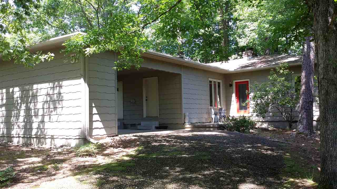 Very nice, updated home minutes from Lake Desoto. Circular Drive thru covered carport and storage.   Total new kitchen, including upscale cabinetry and chef quality hard surface cabinet tops and appliances. Roof and heat pump. Very open floor plan, great room with fireplace leading to large deck and woods. Big bedrooms, each with their own bath.  This home is in excellent condition.b perfect for vacation or permanent. CURRENT TENANT THRU JULY 2017. CALL LISTING AGENT FOR ADDITIONAL INFORMATION.