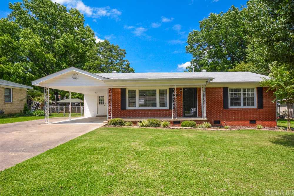 Thoroughly Modern with Echoes of yesteryears! Professionally gutted and rebuilt. Floor plan has been redesigned. Electrical, plumbing, HVAC system, windows, doors, insulation, cabinets, lighting, flooring and appliances all new in 2003. New roof in 2016. The original hardwoods have been preserved. Double wide concrete drive with a single car carport. Outside 14 X 24 workshop w/electric & window air. Convenient to freeway. Move in ready! Ivory Soap Clean!