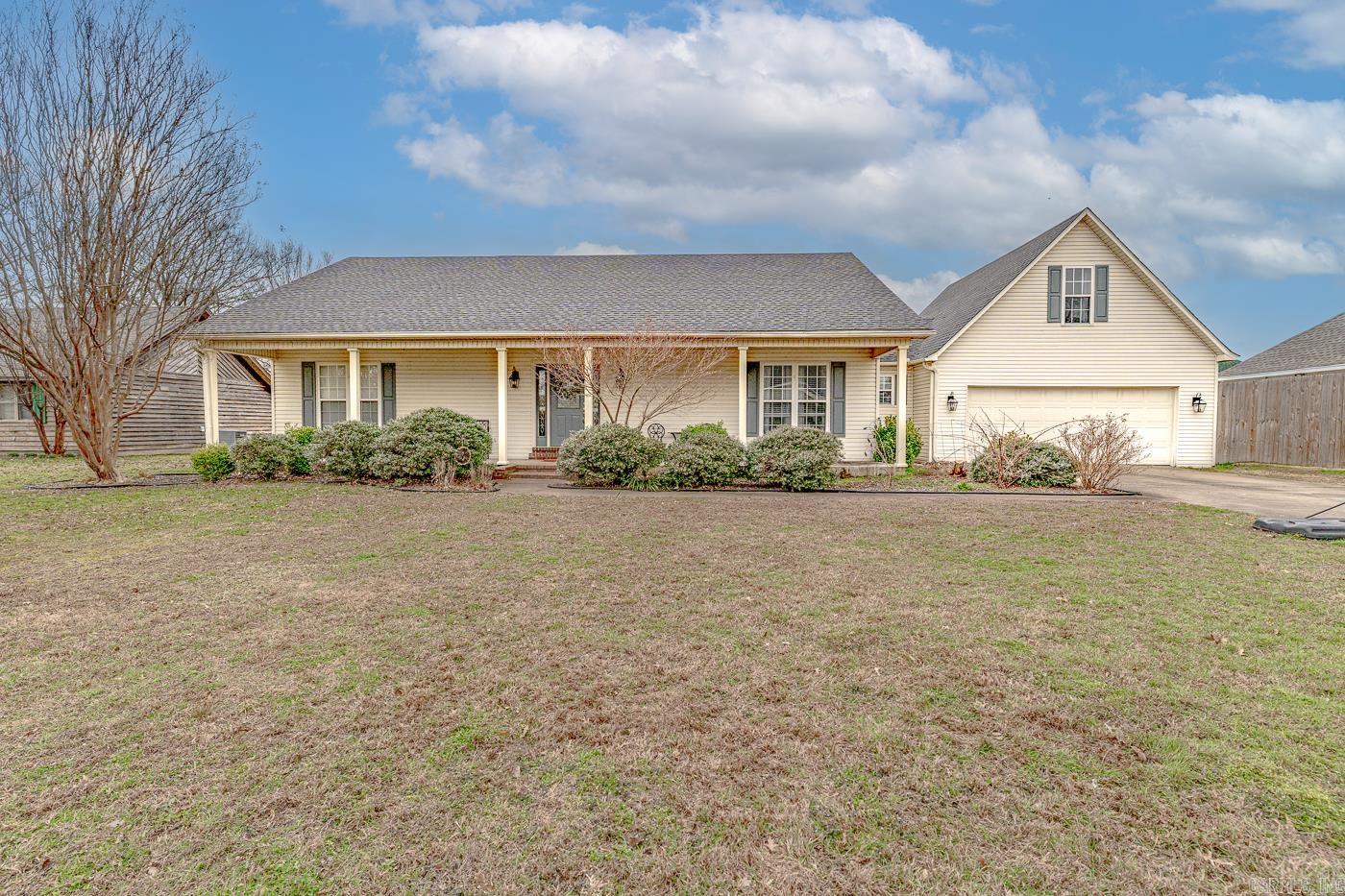 Welcome to Market 103 Key Circle of the Key Cir Sub in Marked Tree, AR within the Marked Tree School District. Situated on a .30 +/- acre fenced & level cul-de-sac lot is a 1999 Ranch home. The exterior is wrapped in vinyl, topped w/ 2023 architectural shingles, and accented by shutters, gutters, covered front porch, back patio, and mature landscaping. The interior features 2,650 +/- sf of well laid out living space and includes an open concept living/kitchen area and dining room. The eat-in kitchen holds stainless steel appliances, bar seating, ample cabinetry, and access to the patio. The large living room offers a cozy gas fireplace. Featuring a split floor plan, the master wing holds the primary bedroom w/ tray ceiling, en-suite w/ dual & make-up vanity, jetted tub, walk-in shower, walk-in closet, and laundry room. The spare wing holds 2 bedrooms and bathroom w/ shower/tub combo. Upstairs is the bonus room, which would make a great 4th bedroom or 2nd living area. Improvements include: encapsulated crawl space and updated appliances & fixtures. Conveniently located near the school, I-555, and within a short drive to Jonesboro & Memphis. Call today to make this house your home.