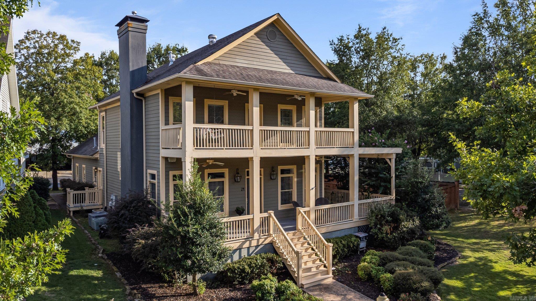 Welcome to Darling Deerberry! This home offers you a feel of southern coastal living while enjoying the close proximity to the city.  The front porch is the perfect place to enjoy the evenings chatting with your neighbors. There are transom windows and French doors throughout the home to offer space separation with openness. Downstairs offers a bedroom, full bath, home office, playroom or flex space, dining room, living room, and a spacious kitchen with ample storage.  The upstairs offers a luxurious primary suite that includes a sitting room for a small office or nursery and a large private patio for sneaking away with a good book. Additionally, there is another bedroom and bonus room or two bedrooms depending on your space needs. My favorite part is the big backyard and back porch that is perfect for watching the kids or furry friends run wild while you relax.