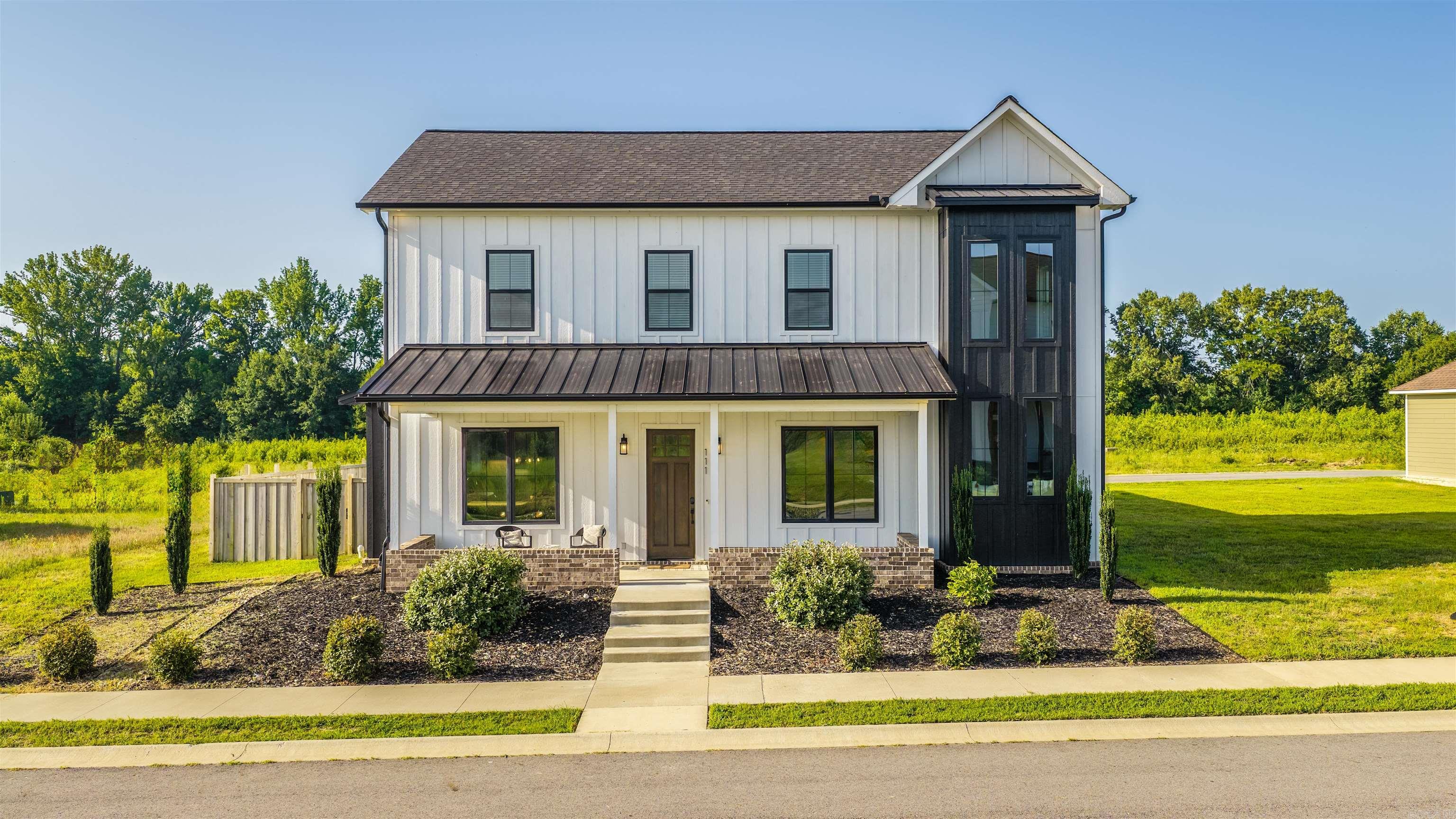 This timeless Craftsman home meets the modern farmhouse style buyers are searching for. From the moment you step inside, you'll love the bright, open layout designed for both everyday living and effortless entertaining. With 4 bedrooms, 2.5 baths, a dedicated office, and a second family room, there's space for everyone to spread out, work, relax, and make memories. The main-level primary suite is a true retreat, featuring a spa-inspired bath with a beautiful slipper tub, custom tile, and a spacious walk-in closet. The heart of the home is the stunning kitchen with quartz countertops, ceiling-height cabinetry, a large pantry, and an inviting design that keeps everyone connected. Move-in ready and packed with value, the washer, dryer, and refrigerator all stay! Enjoy lower utility bills thanks to extra insulation and energy features, while having the comfort and peace of mind of a thoughtfully built home. Outside, you'll find fencing, landscaping, and curb appeal that welcomes you home each day. Located with easy interstate access and close to shopping, dining, schools, and everyday conveniences, this home offers more space, more style, and more value at a price you'll love. Come see