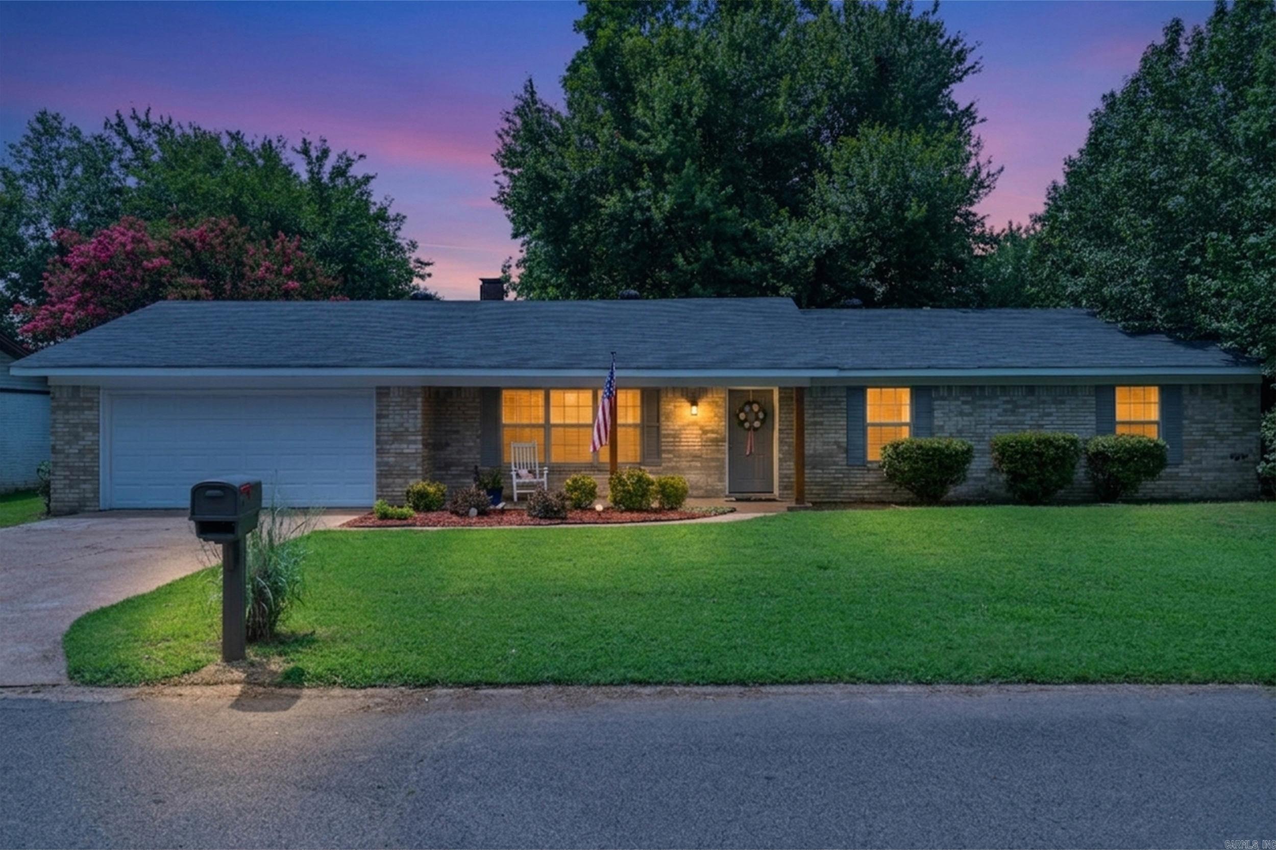 Step right up and turn this house into your cozy castle today! Picture this: soaring vaulted ceilings, charming wooden beams, and an electric fireplace with a mantle perfect for showing off your seasonal flair. The home has been spruced up inside and out, with an HVAC and roof that are just four years old. Nestled in a sought-after neighborhood, this beauty has a fully fenced backyard complete with a covered patio, a majestic pecan tree, and bushes bursting with blackberries and elderberries. It's a shady backyard paradise just waiting for you!