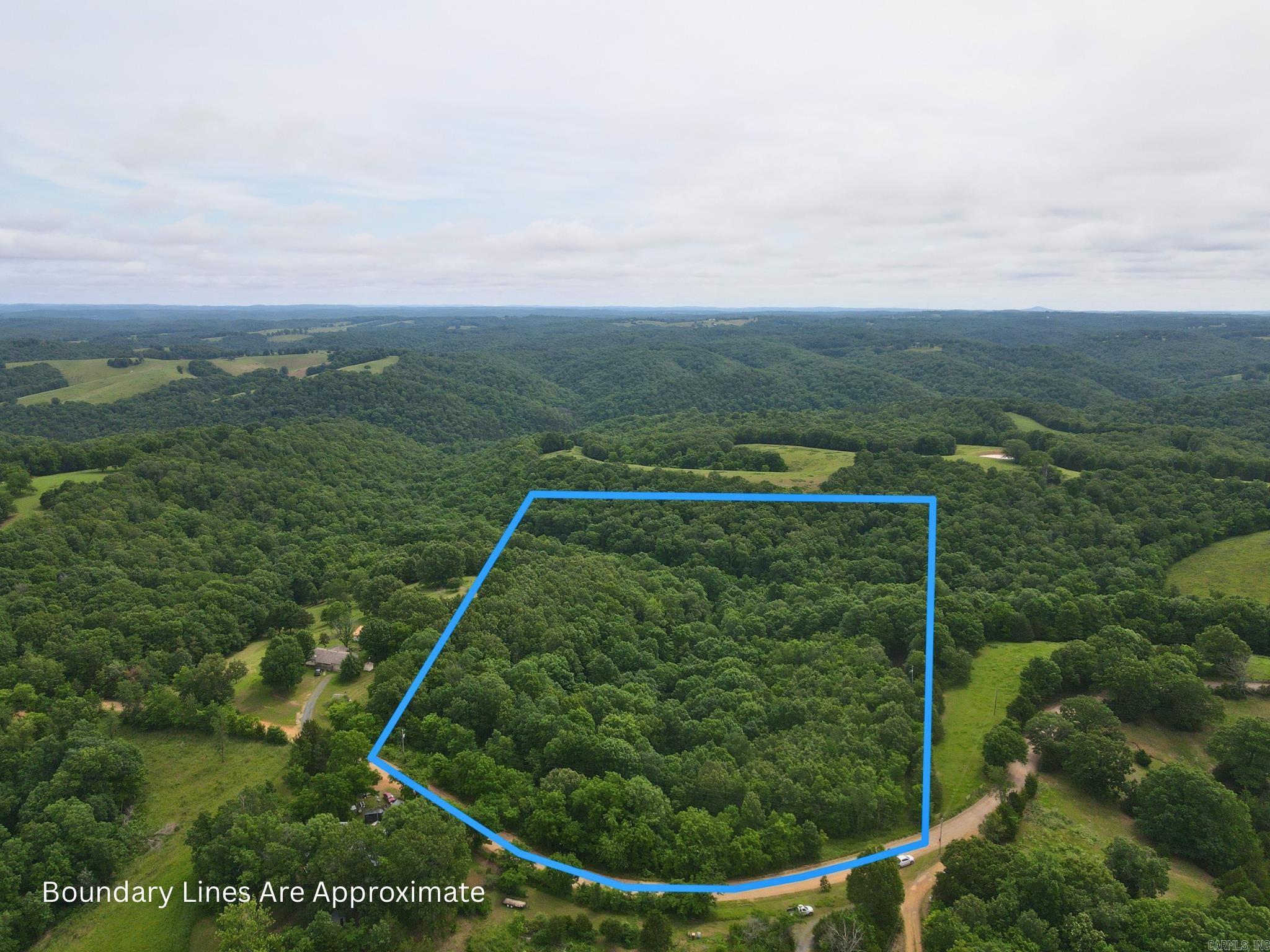 Escape to the beauty of the Ozarks with this 16.61 +/- acre property offering county road frontage, easy access, and both water and electric already on the property. Located just minutes from the Buffalo National River Park, this tract is ready for your dream home, cabin, recreational retreat, hunting property or investment opportunity. With a great combination of accessibility, available utilities, and a peaceful rural setting, you’ll enjoy the best of country living while being close to one of Arkansas’ most treasured outdoor destinations. Whether you’re looking for a place to build, relax, or explore, this property offers endless possibilities.