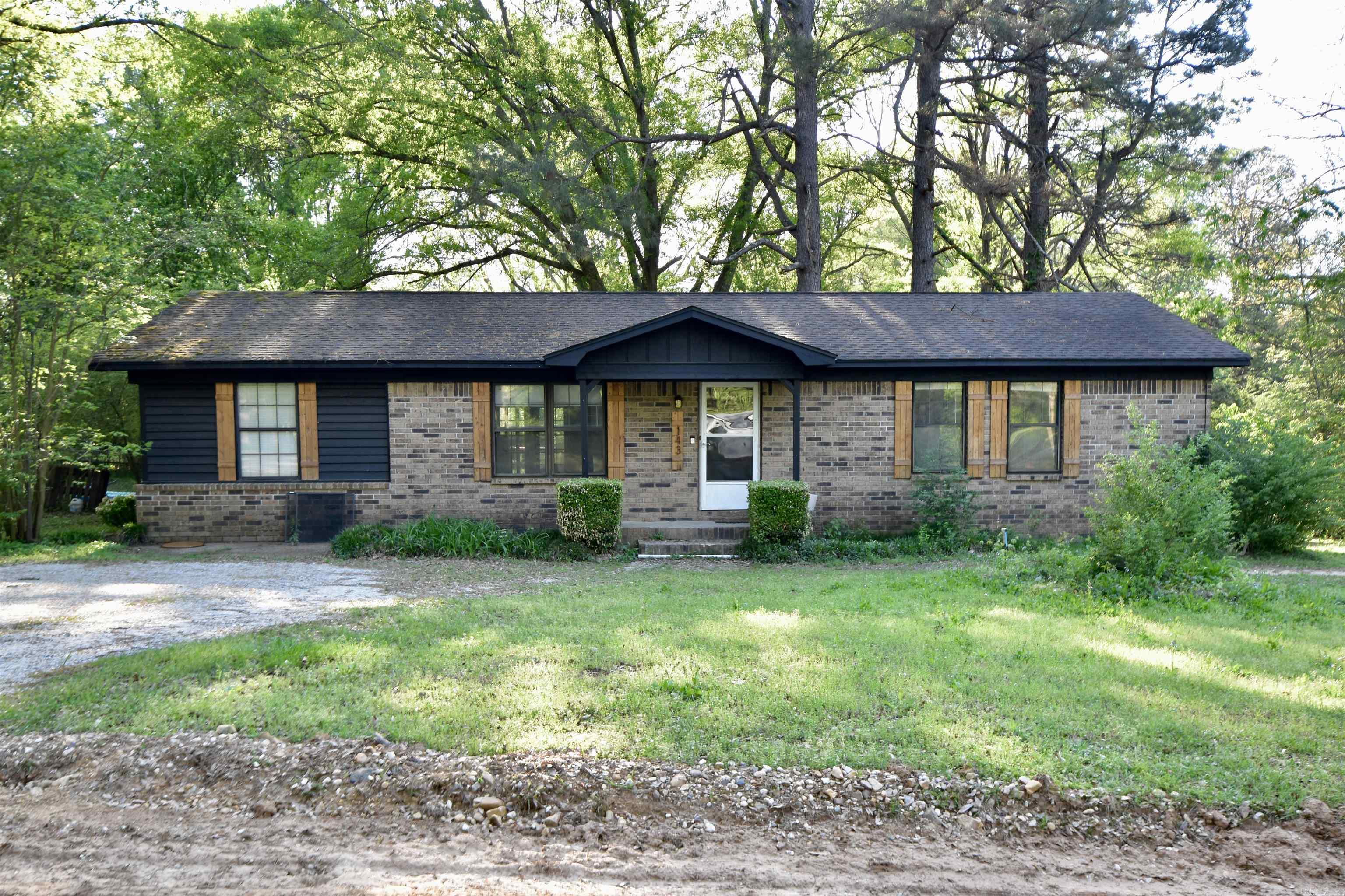 Discover the potential in 143 Windmill Ln! Back on the market due to no fault of the seller! This 4-bed 1-bath home offers a functional layout featuring an eat-in kitchen with a convenient breakfast bar, ideal for casual dining. A dedicated laundry room adds everyday convenience. The home includes a walk-in shower for added comfort and accessibility. Step outside to enjoy the back deck, perfect for relaxing or hosting, all overlooking a spacious 1.04-acre lot. The fully fenced backyard provides plenty of room for pets, play, or outdoor activities, and includes a storage shed for added functionality. This home is being SOLD AS IS. Great opportunity for homeowners ready to create their dream space. With solid features and room to grow, this property is full of potential!