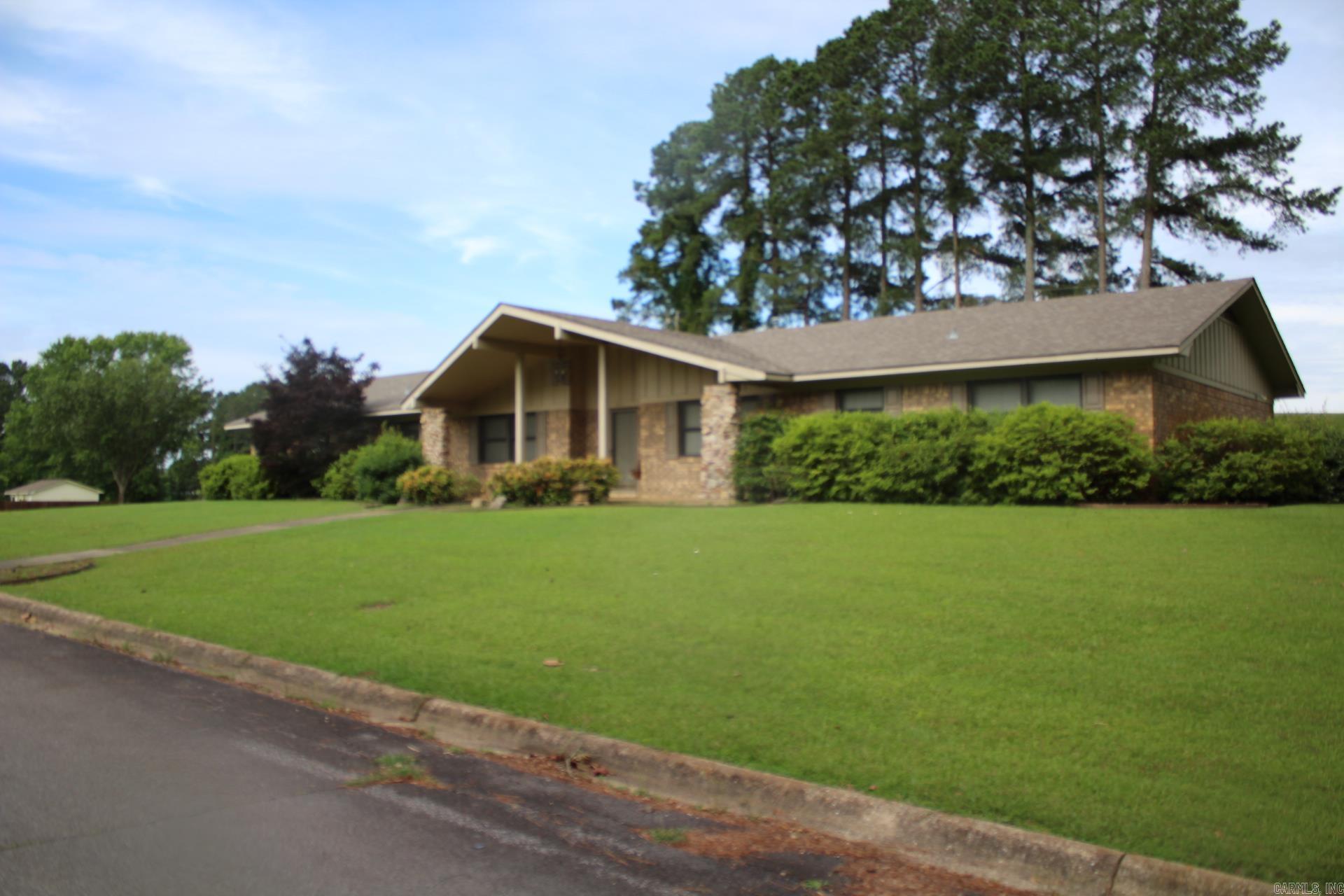 MOVE IN READY 3 BEDROOMS, 2.5 BATHS with approx. 2791 Sq. Ft. of living space situated on approx. .63 acres in the heart of Nashville. Large kitchen with great storage space, granite (Range, refrigerator, washer & dryer to convey with sell of Home).  Large family area features beamed ceilings, wood burning fireplace.  Master bath features double sinks.  Central A/C & Heat. 2 car attached garage and a detached 2 car carport. Roof is only 3 years old.  Property has auto lawn watering system.