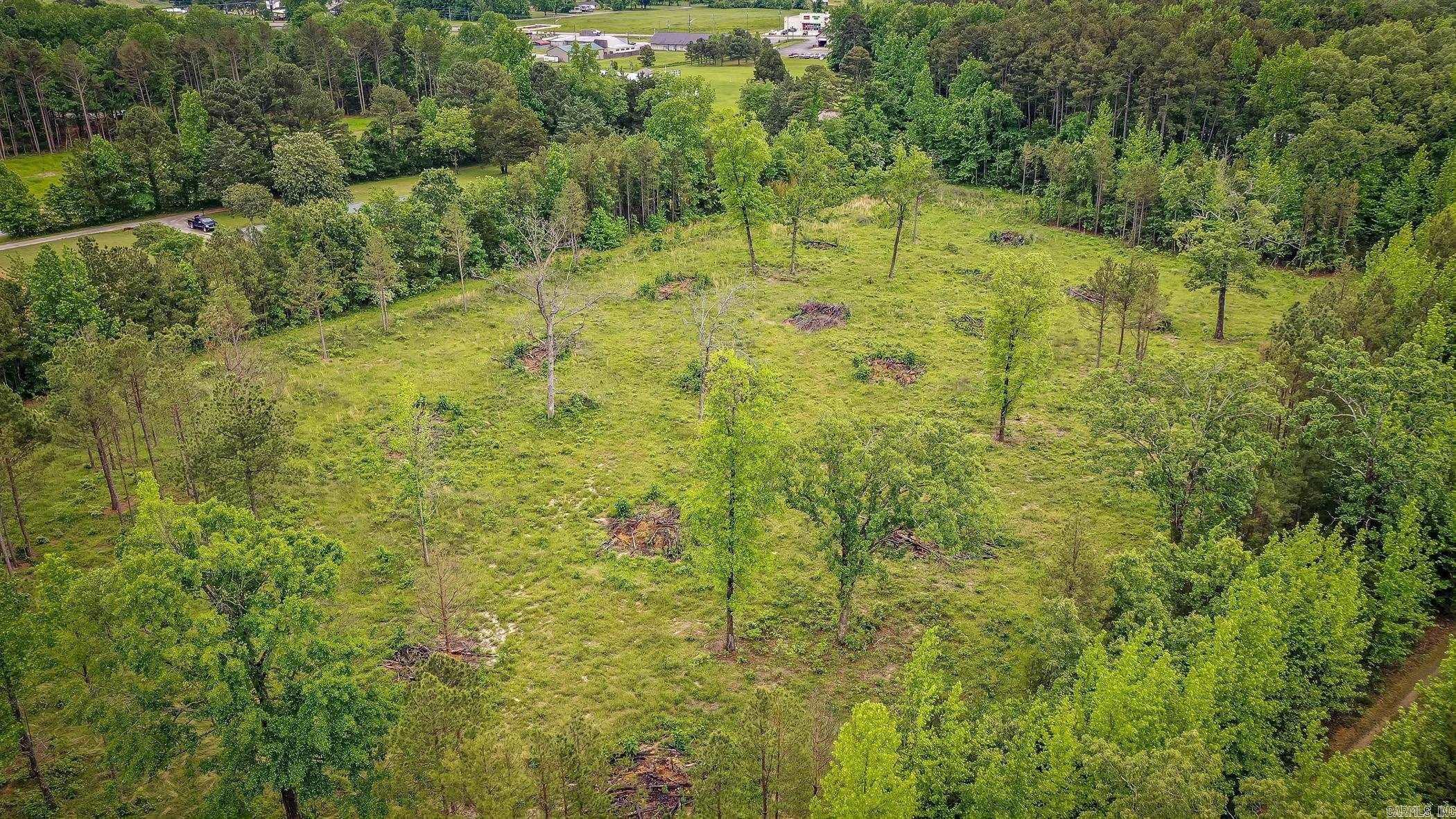8.54 acres located less than a mile from the lake! Located in the middle of Greers Ferry, this property could be used for a single-family home or to build a family retreat or subdivision secluded by trees with the quiet sounds of nature surrounding you! A small pond allows for fishing, and plenty of deer! You will be located within 2 miles of Shiloh Marina, Lacey's Marina, and Devils Fork Park. Taxes are unknown, as this is part of a 30-acre tract. Some photos have been computer-altered to show you the potential of this great tract of land! Call to see today!