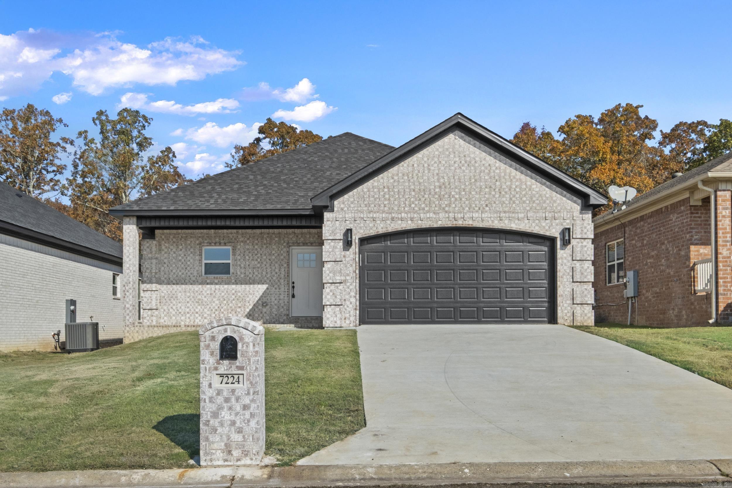 Affordable New Construction in Sherwood. This home is beautifully built with attention to detail. Covered porch in the front and covered patio in the back. All brick for easy maintenance. 9'-10' Ceilings throughout. Granite counter tops. Stainless Steel appliances. Crown molding throughout the home. Windows capped and trimmed. Walk-in master closet. LVP floors in living room, kitchen, and dining area. Custom tile in all bathrooms. Fireplace in the living room. All electric for easy maintenance.