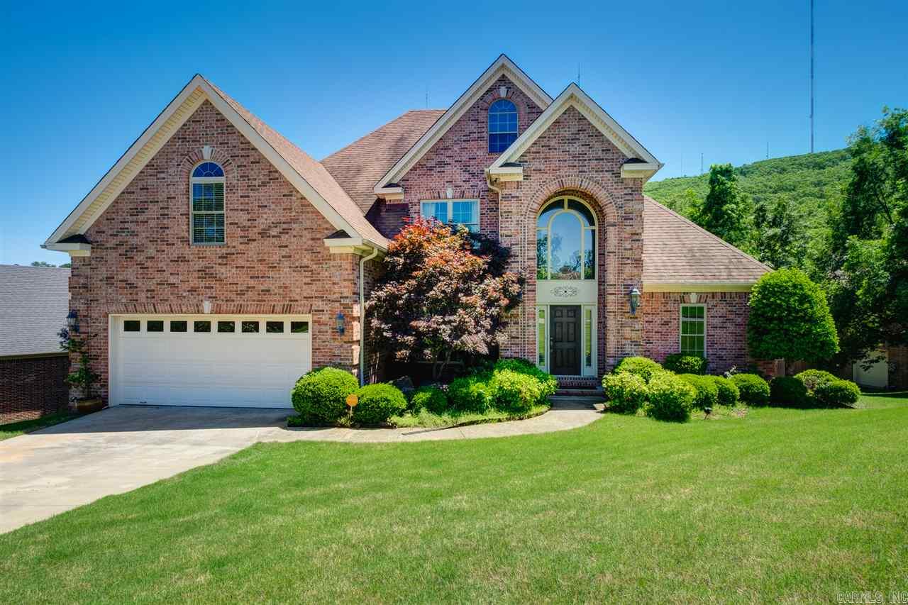 Wonderful layout for your family!  New roof going on this month! Master and guest room on the main level and two more bedrooms and large playroom upstairs. Wonderful large back yard with newly painted deck that is perfect for entertaining.  In the process of being touch up painted. Don't miss this one.  Great buy!