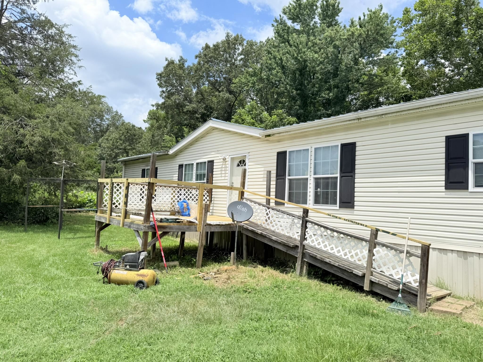 Escape to the peace and privacy of country living with this 2017 double-wide modular home situated on 38 acres. Whether you're looking for a homestead, hobby farm, hunting retreat, or room to expand, this property offers endless possibilities. The home features a comfortable, open-concept layout with spacious living areas, a functional kitchen with a great size pantry. Experience the perfect balance of modern comfort and country charm while still being within convenient driving distance of nearby towns and amenities. Don't miss this rare opportunity to own 38 acres with a move-in-ready home and unlimited potential!