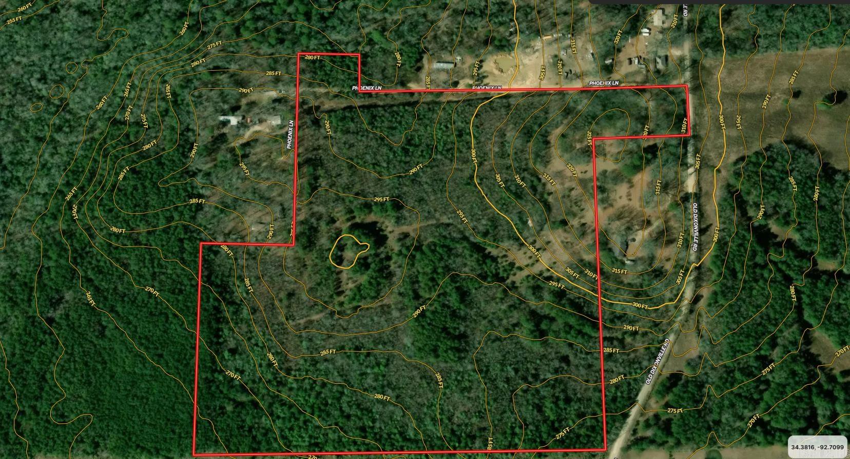 36 acres with some grown up pasture and big mature trees.  Beautiful building.
