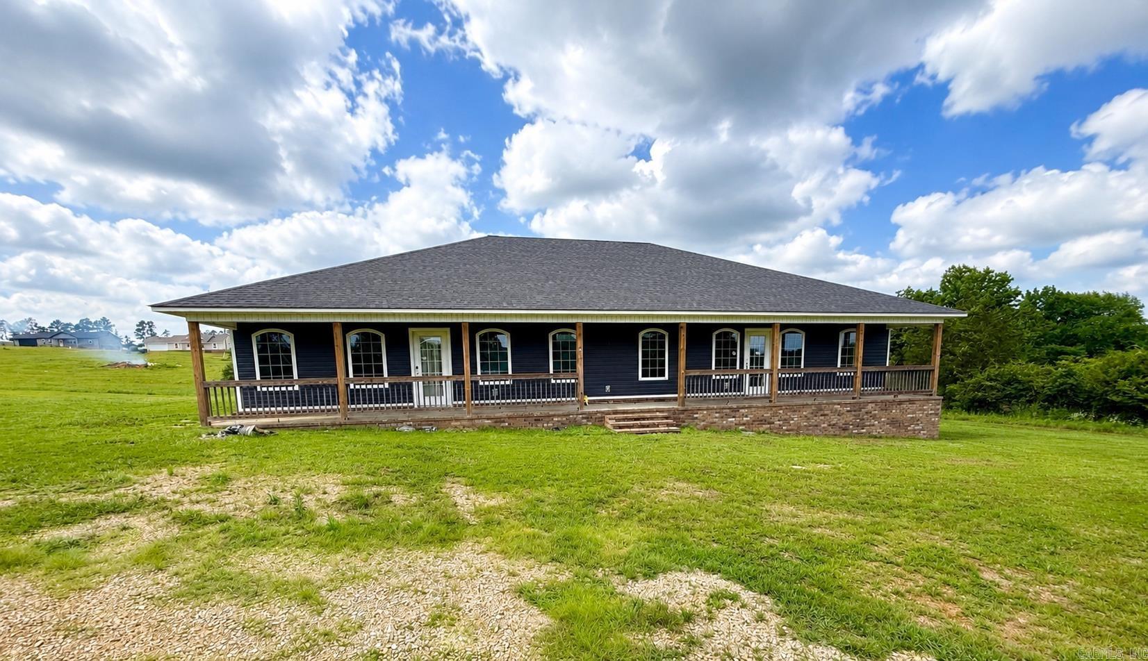 Experience modern country living in this stunning 2021-built home featuring 5 bedrooms, 3 bathrooms, and 2,225 sq. ft. situated on nearly 1 acre with gorgeous mountain views. Located outside city limits, this property offers peaceful privacy while showcasing stylish modern touches throughout.  There's a double floor plan that contains the perfect setup for multi-generational living, a private mother-in-law suite, guest quarters, or a potential rental opportunity. The beautiful main kitchen serves as the heart of the home with updated finishes and space for entertaining.  Step outside to enjoy the oversized front porch, ideal for relaxing and soaking in the surrounding countryside views. With spacious interiors, flexible living arrangements, and scenic outdoor beauty, this property combines comfort, functionality, and modern elegance in one exceptional package.  Call today for your showing!