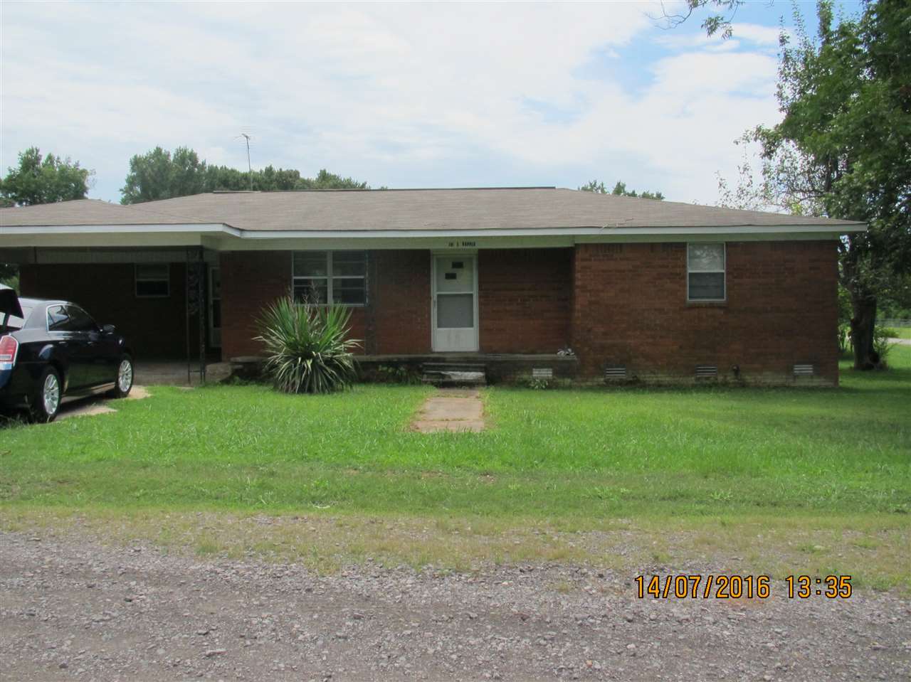 Property is on approx. 1/2 acre corner lot with pecan, pear and fig tree.  Both bedrooms are good size rooms.  Large utility  room.  Open kitchen and dining room or could have another living area.  Living room separate.  Storage building outside.