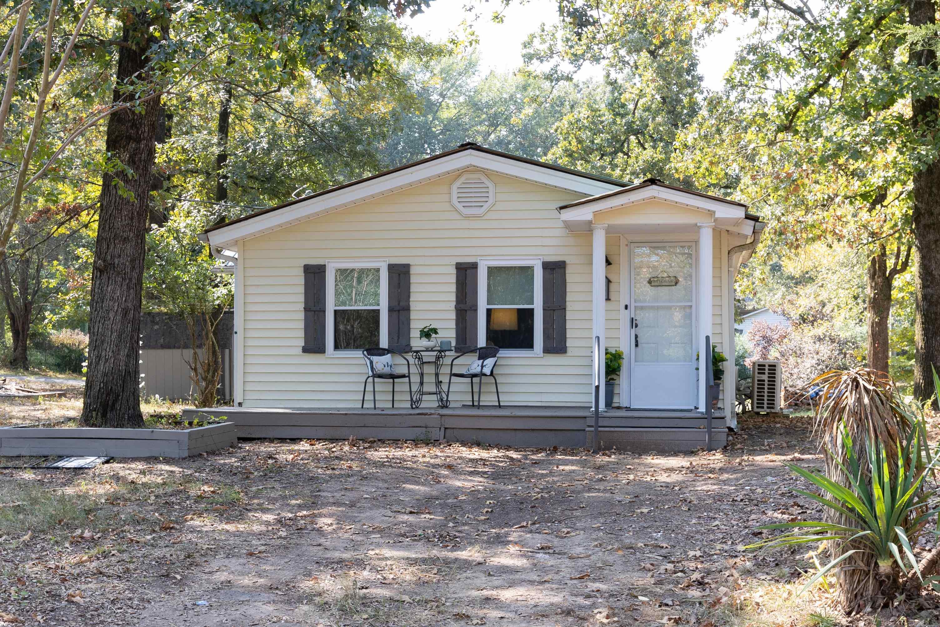This charming, lake-view cottage sits on 2 lots and has had ALL the renovations you can desire! It has been updated down to the floor joists! It features a metal roof, metal carport for parking your car or boat, and storage shed for those fishing poles! Move in and enjoy everything lake life has to offer. You have lake views of Harris Brake Lake! Harris Brake lake is the third largest lake owned by the Arkansas Game and Fish Commission. It is known for its fishing and bird watching. This property also sits conveniently between 2 boat ramps on the lake - Harris Brake Dam Boat Landing & Chitman Hill Landing.