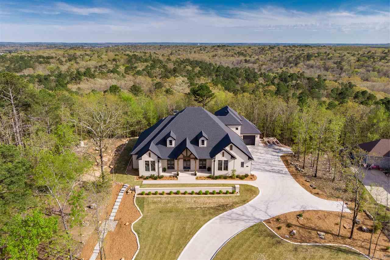 Stunning Home with Gorgeous Views and Wonderful Privacy! Exquisite Finishes! Expansive front porch which overlooks green space. Beautiful Entry opens to large foyer and dining with pass-thru Butler Pantry.Open Great Room & kitchen w/views of lush greenbelt Stunning Chef's Kitchen. Private master suite with beautiful detailing, barn door to spa bath retreat & dream closet. Additional 3 bedrooms suites on main level w/private baths.Upstairs has Bonus or 5th Bedroom/full bath! ONE OF A KIND  See agent Remarks.