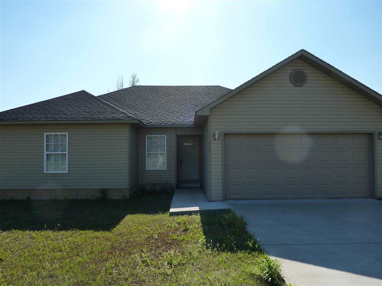 Great house with an even better location. Close to 67/167 for easy commuting. Split floor plan, wood floors in living area, large yard & storage building. Sq. Ft. approx. measuring encouraged.
