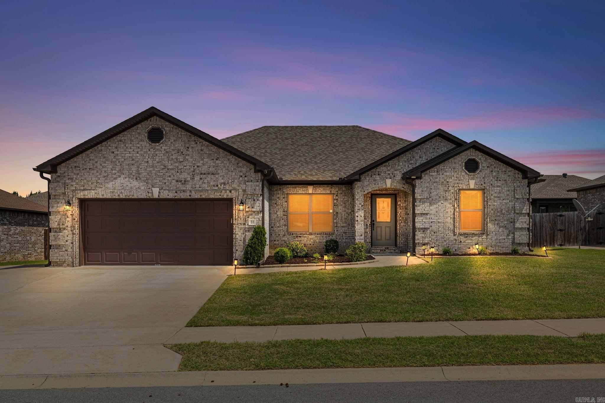 Welcome to 33 Cimarron Circle in Cabot, Arkansas! This beautiful all brick home features a split~open floor plan with LOTS of space and natural light! This home has all the extras coffered ceiling, mudroom and large laundry room. Fall in love with the HUGE kitchen that has tons of storage, counter space, a large island, under cabinet lighting, stainless steel appliances and a pantry! Primary bedroom features a tray ceiling and in the primary bathroom you will find a walk-in shower with glass doors, soaking tub, double vanity sinks, a toilet room, & a huge walk-in closet! This home also features great sized guest bedrooms, ceiling fans throughout the home, tons of closet space throughout. Heading out back you will find an oversized covered back patio and the fenced yard is perfect for entertaining! Seller will provide up to $8000 of buyer's closing costs or points buy down with acceptable offer! This is home! Call today for your private tour!!
