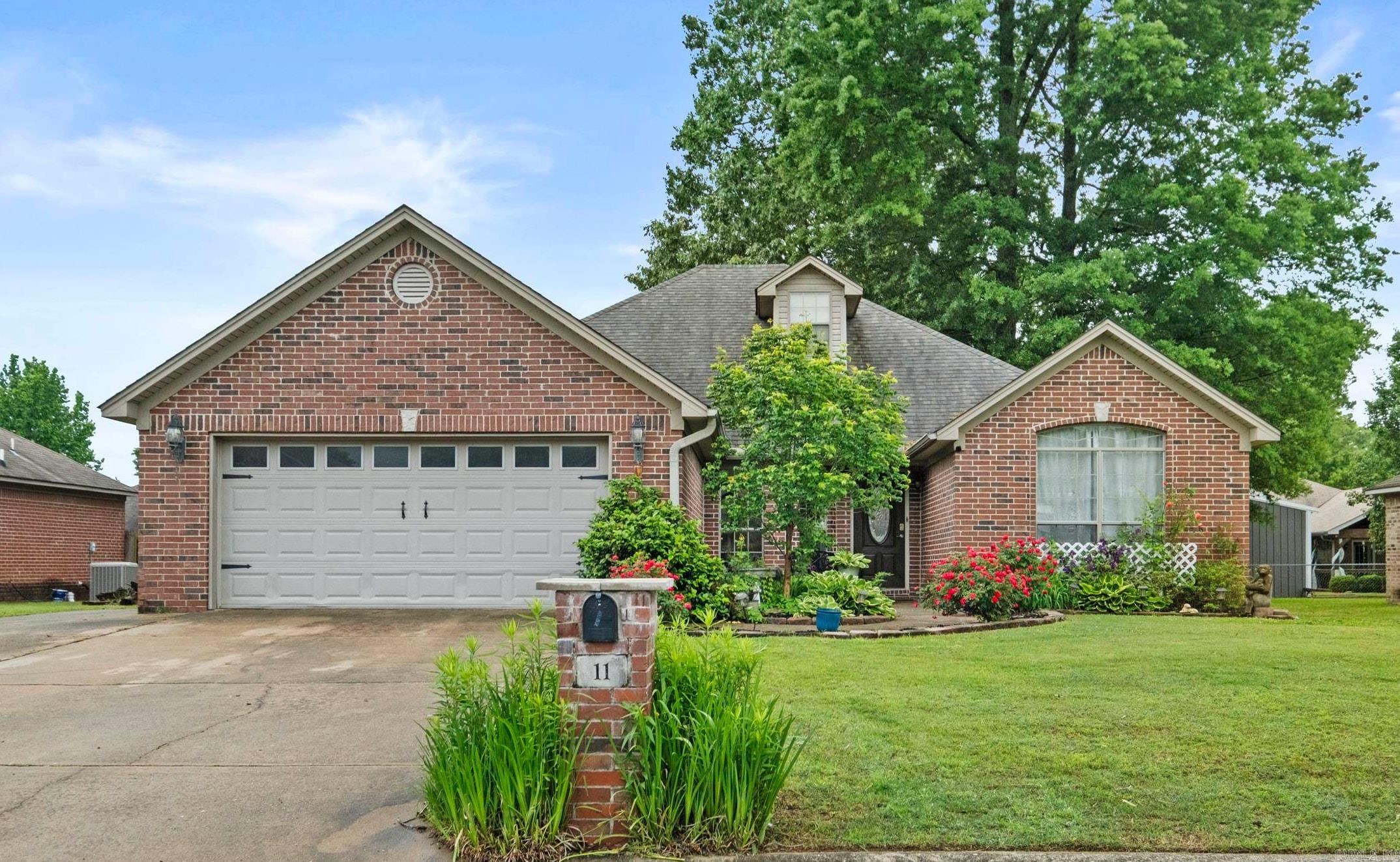 Welcome Home!!! This beautiful, spacious home offers fantastic curb appeal and is located in the desirable Turtle Creek Subdivision, just outside the city—qualifying for 100% financing through a Rural Development loan. Featuring 4 bedrooms and 2 full bathrooms, this home provides a functional & inviting layout. The large kitchen includes 2 dining areas on either side & was recently updated in Dec 2024 with quartz countertops, a stylish backsplash, new sink, & freshly painted cabinets. The laundry room is conveniently located just off the 2-car garage & opens into one of the dining spaces. A walk-up attic offers extensive floored storage and the potential to be finished out as a bonus room or additional bedroom. The spacious living room features a cozy gas fireplace. The primary suite is privately situated & includes a large walk-in closet. The en-suite bathroom offers double sinks, a separate walk-in shower, & a relaxing jacuzzi tub. 3 additional bedrooms are thoughtfully arranged, w/one located toward the back near the main bathroom & the other two positioned toward the front of the home. Enjoy outdoor living w/a covered patio & 8ft privacy-fenced backyard. Agents see remarks.