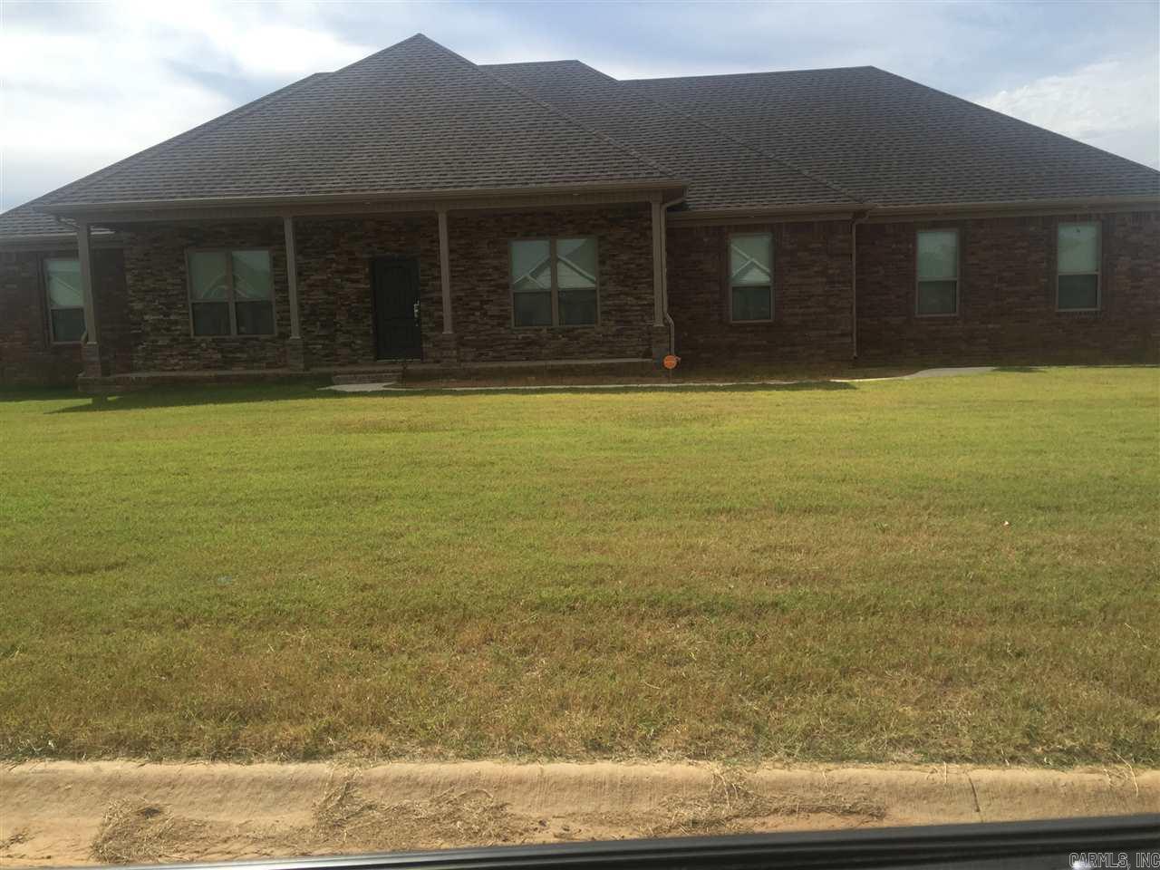 Custom Home that contains large Safe room, Over size Garage, 17 Sear AC unit, 3 Bathrooms,  Master suite has custom shower with step in ordered soaker Tub.  Beautiful custom cabinets in Master suite as well as Kitchen area.   Barn Doors accent the Master suite.   Fenced yard Much more.