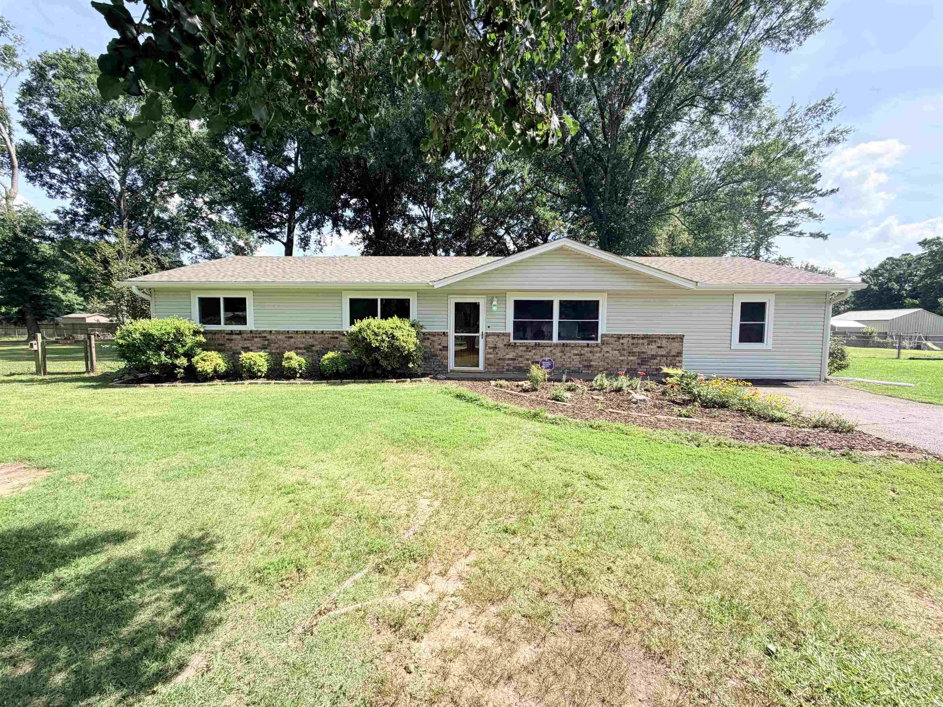**RD Eligible!** Don't miss this move-in ready gem nestled on nearly a full acre in the heart of Saline County! Offering 3 bedrooms, 2 bathrooms, and a versatile bonus room perfect for a home office or flex space, this home checks every box. Major updates are already done — new HVAC, roof, water heater, and doors all within the last few years, plus fresh paint throughout...AND the septic tank has just been pumped ensuring all your big ticket items are already taken care of! 2-car garage and additional shed provide plenty of storage.  Located just 13 minutes from both Benton and Bryant, enjoy peaceful country living without sacrificing convenience. Zoned for the Bryant School District and RD eligible — an incredible opportunity you won't want to pass up!