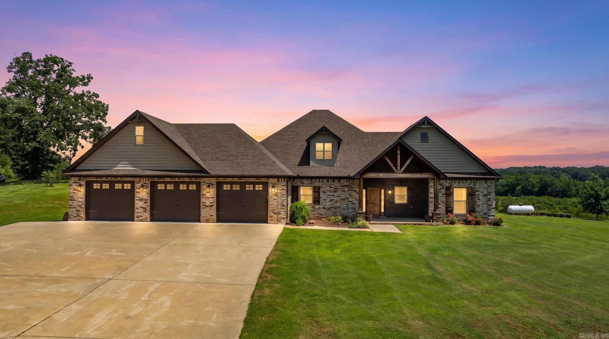 Perched atop a scenic ridge in Greenbrier, this 3 bedroom, 2.5 bath home sits on 4.28 beautiful acres with breathtaking views of rolling hills and endless trees. Enjoy peaceful country living, unmatched privacy, and stunning sunsets - all just minutes from Conway and I-40.