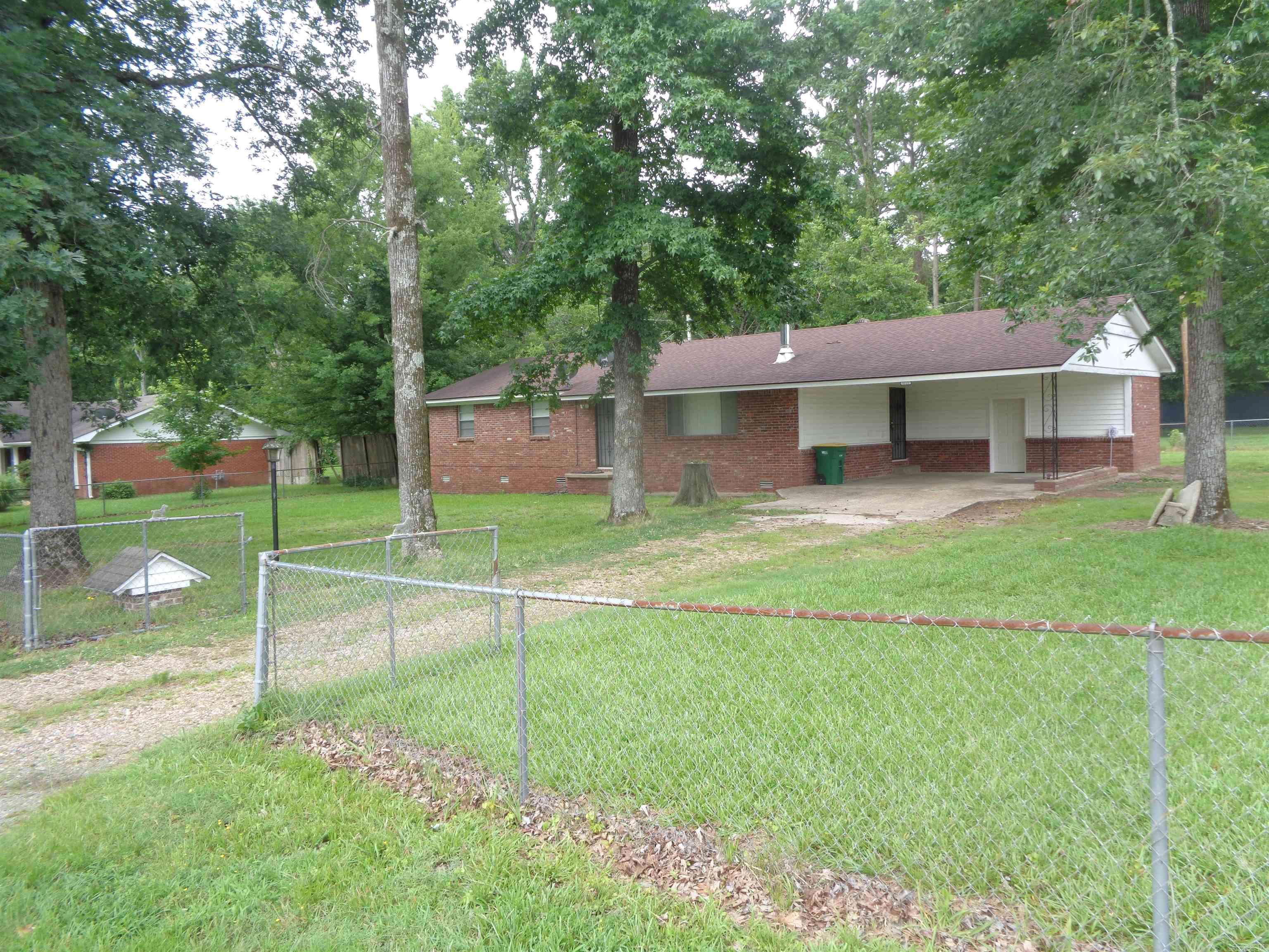 Country living in the city with this spacious 3 bedroom all brick home on a huge completely fenced yard. The house has been updated and its clean and ready for a new owner. Note the unique fireplace stove. The refrigerator to convey. Agents please check remarks.