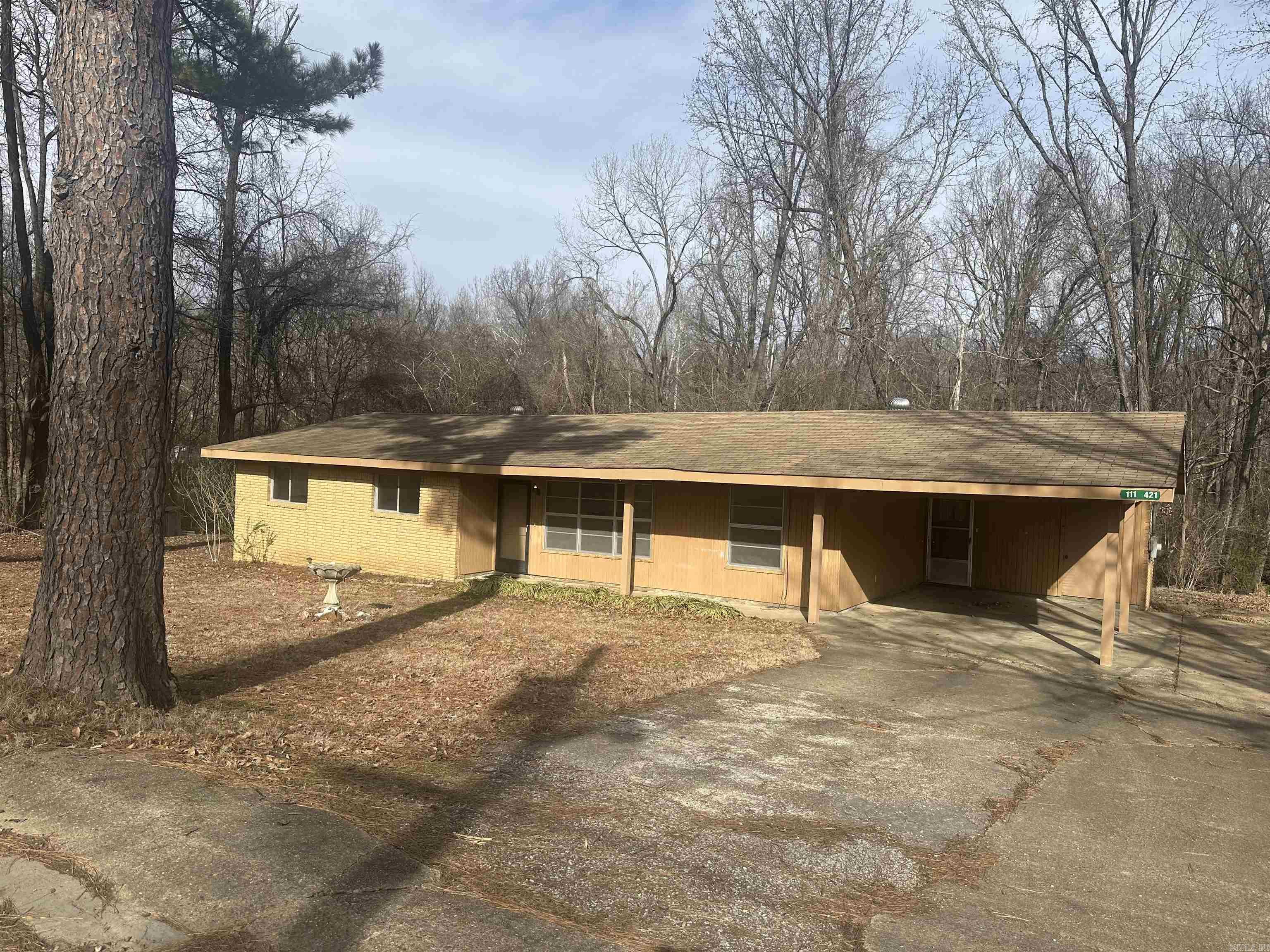 New Listing Just outside of Forrest City.  Discover this charming 1,540 sq. ft. home nestled among mature trees in a peaceful, quiet neighborhood.  This beautiful property features 3 spacious bedrooms and 2 full bathrooms.  Double carport offering both comfort and convenience.  Enjoy the perfect blend of country living with easy access to town amenities.  This home is ideal for families or anyone seeking space, privacy and tranquility.