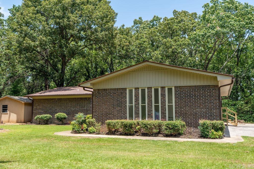 Photographs coming soon! The Lakefront home you've been looking for is in the beautiful quiet Beloit Bay neighborhood. Located between Heber Recreation Park/marina and Eden Isle you will beclose to boating or golfing. This home has been almost completly renewed with new wood, tile and carpet throughout. The kitchen and baths have all been updated with new appliances and fixtures. All new windows and doors.The spacious primary suite is separate from the others and has the view toward Greers Ferry Lake. Enjoy the site built fireplace in the large living room wihile the kids play in the new 300+ square foot bonus room! There is a 16 X25 shop/storage building for your lake toys and lawn equipment. Call for your tour today!