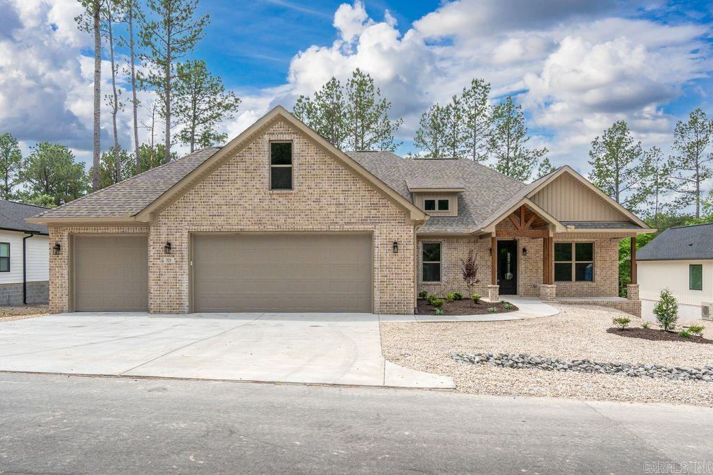 This stunning new construction home is the perfect combination of quality and luxury all wrapped up in 2,187 sq ft! Located just one minute from the Granada Clubhouse, this home was thoughtfully designed with 3 bedrooms plus an office, 2.5 bathrooms, large, living room, dining area and spacious 3-car garage providing plenty of space for vehicles and storage. The open-concept layout is enhanced by luxury LVP flooring, a functional mudroom, custom built-in cabinetry, a gas fireplace, and sleek finishes throughout. The chef-inspired kitchen features quartz countertops, walk-in pantry, floor-to-ceiling cabinetry, GE appliances, gas cooktop, and a convenient pot filler, ideal for both entertaining and everyday use. Step outside to enjoy the large covered back patio featuring a vaulted tongue-and-groove ceiling, creating the perfect outdoor living space year-round. Additional features include easy-to-maintain landscaping and staircase access leading to a floored attic for additional storage possibilities. Enjoy access to 9 golf courses, 11 lakes, and miles of trails—a lifestyle made possible by the one-time HSV buy-in fee of $2,000 for new property owners.
