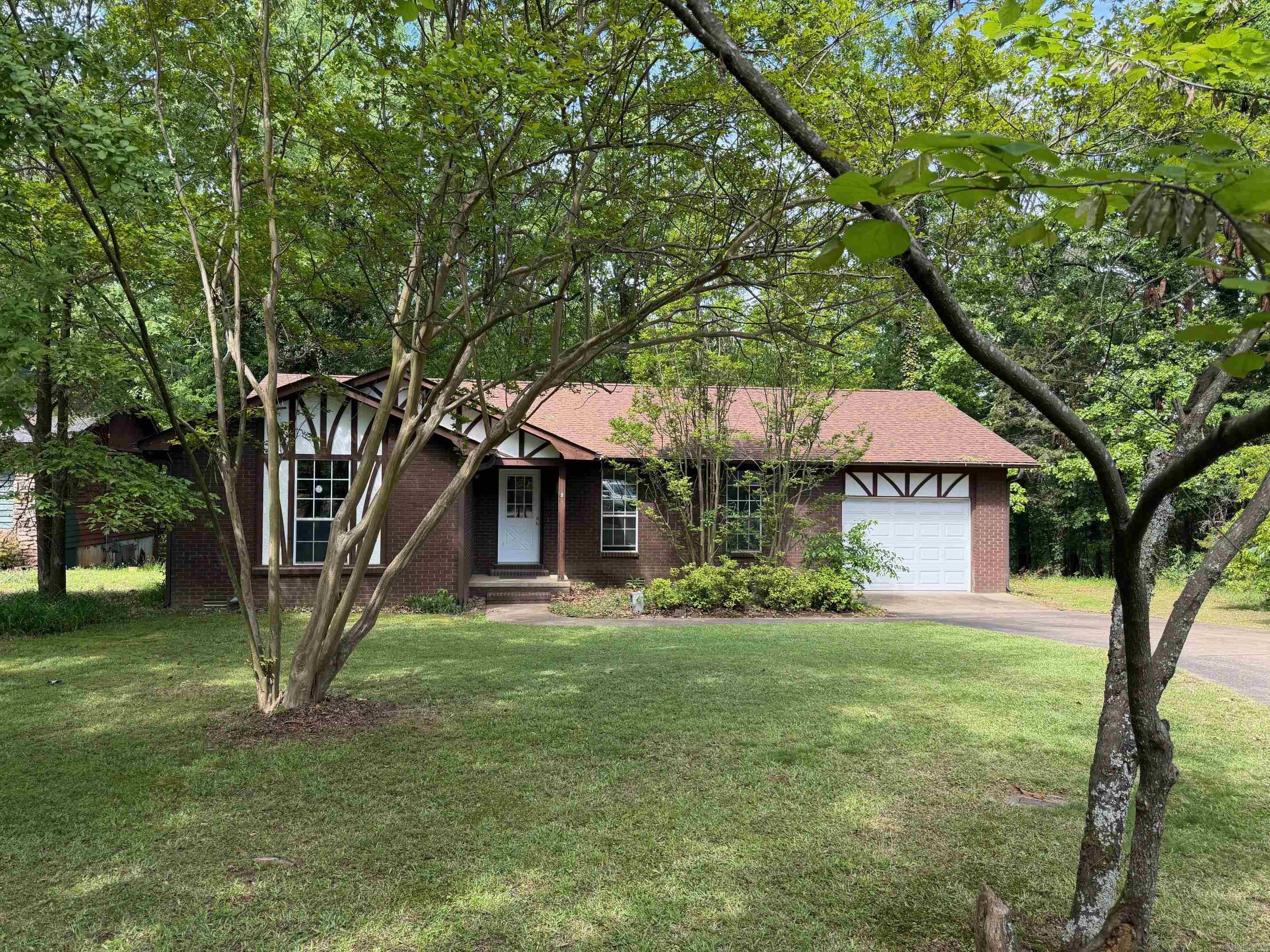 WELCOME HOME! Tucked away in a beautiful, secluded neighborhood in Clarksville, this precious 3 bedroom, 2 bath home sits quietly in a peaceful cul-de-sac just minutes from schools, shopping, the aquatic center, and easy access to I-40. This move in ready home features numerous updates, including a new roof with gutters, new HVAC system, new hot water heater, and a full suite of updated kitchen appliances: gas stove, vent hood microwave, and a dishwasher, along with updated fixtures and toilets throughout. Step outside to enjoy the fenced backyard with a spacious deck, perfect for relaxing or entertaining. An added bonus is the basement ideal for storage or use as a storm safe room. This home offers the perfect blend of comfort, convenience, and peace. Don't miss your chance to make it yours!