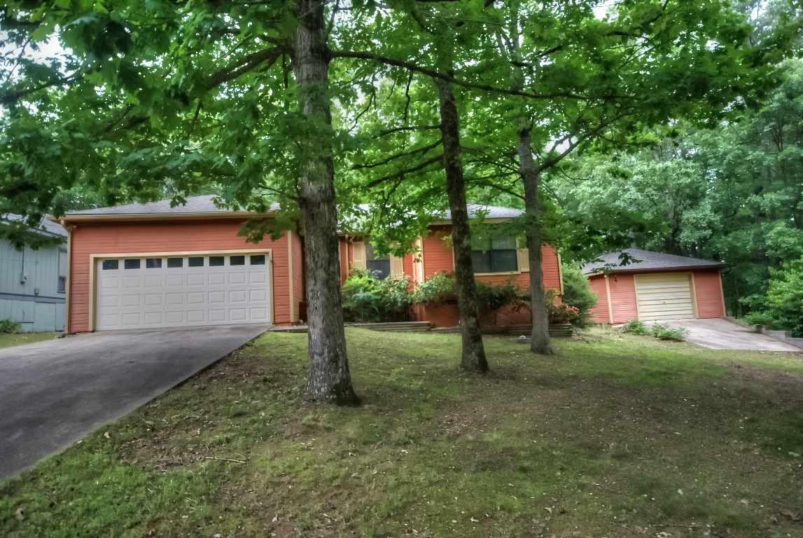 Great home with detached shop building for lake toys or a man cave. Within 10 minutes to Greers Ferry Lake, and 2-18 hole championship golf courses, hiking & biking trails, utv/atv trails, shopping, dining, tennis and more.  This home sits in a great neighborhood of Fairfield Bay.  Fenced in back yard for pets. There is a bonus room, that could be used as an extra den.  Master bathroom has been updated. New stainless kitchen appliances, great fire place in living room. Great Buy.