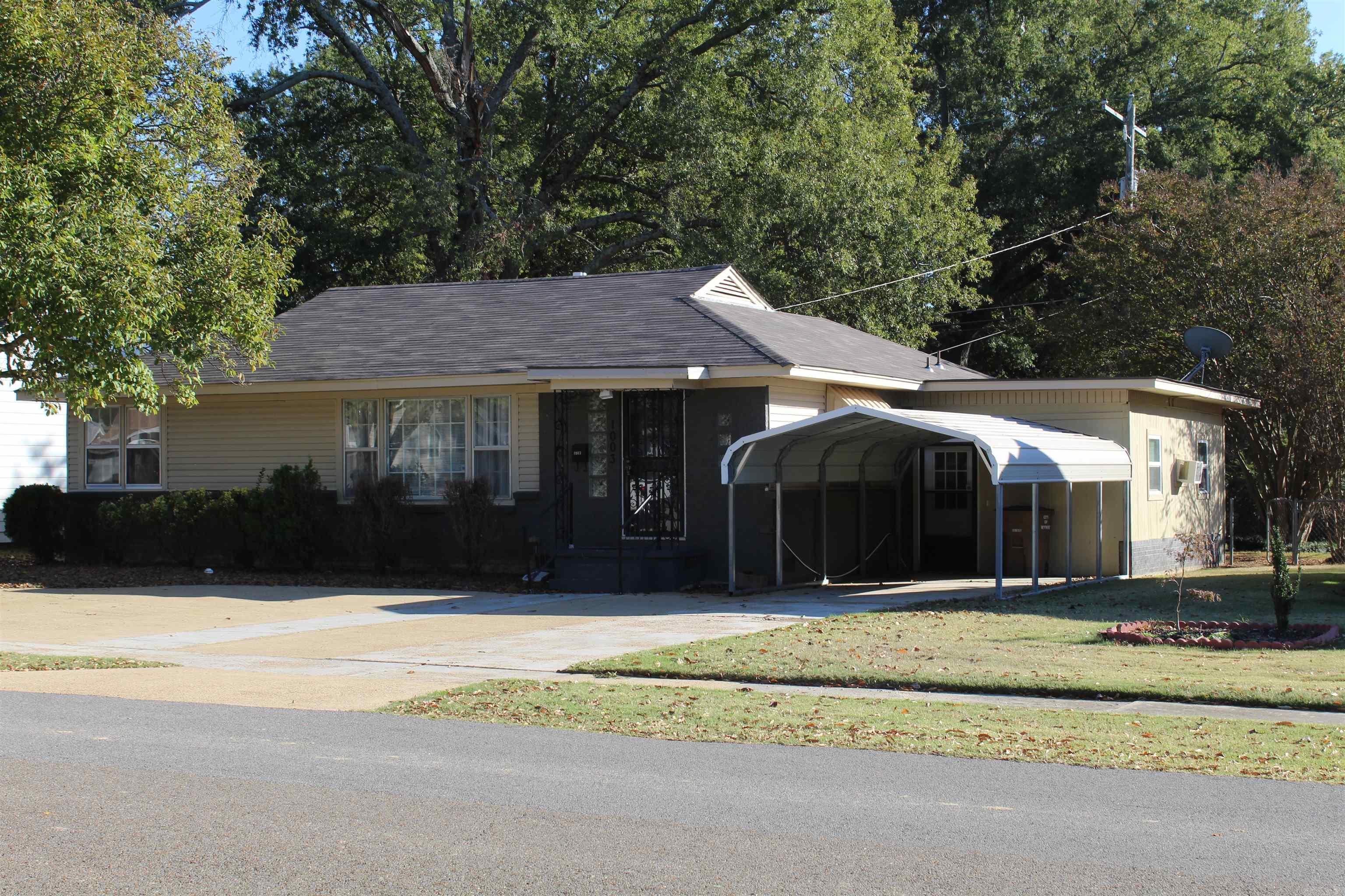 Priced to sell! This 3 bedroom, 2 bath home features hardwood floors through a majority of the home, has a large eat-in kitchen, new roof, metal carport, fenced backyard and 2 storage sheds. Enclosed carport is cooled by a window unit and could be modified to create a nice den, game room or study. This home is being sold as-is and seller will not entertain repair requests.