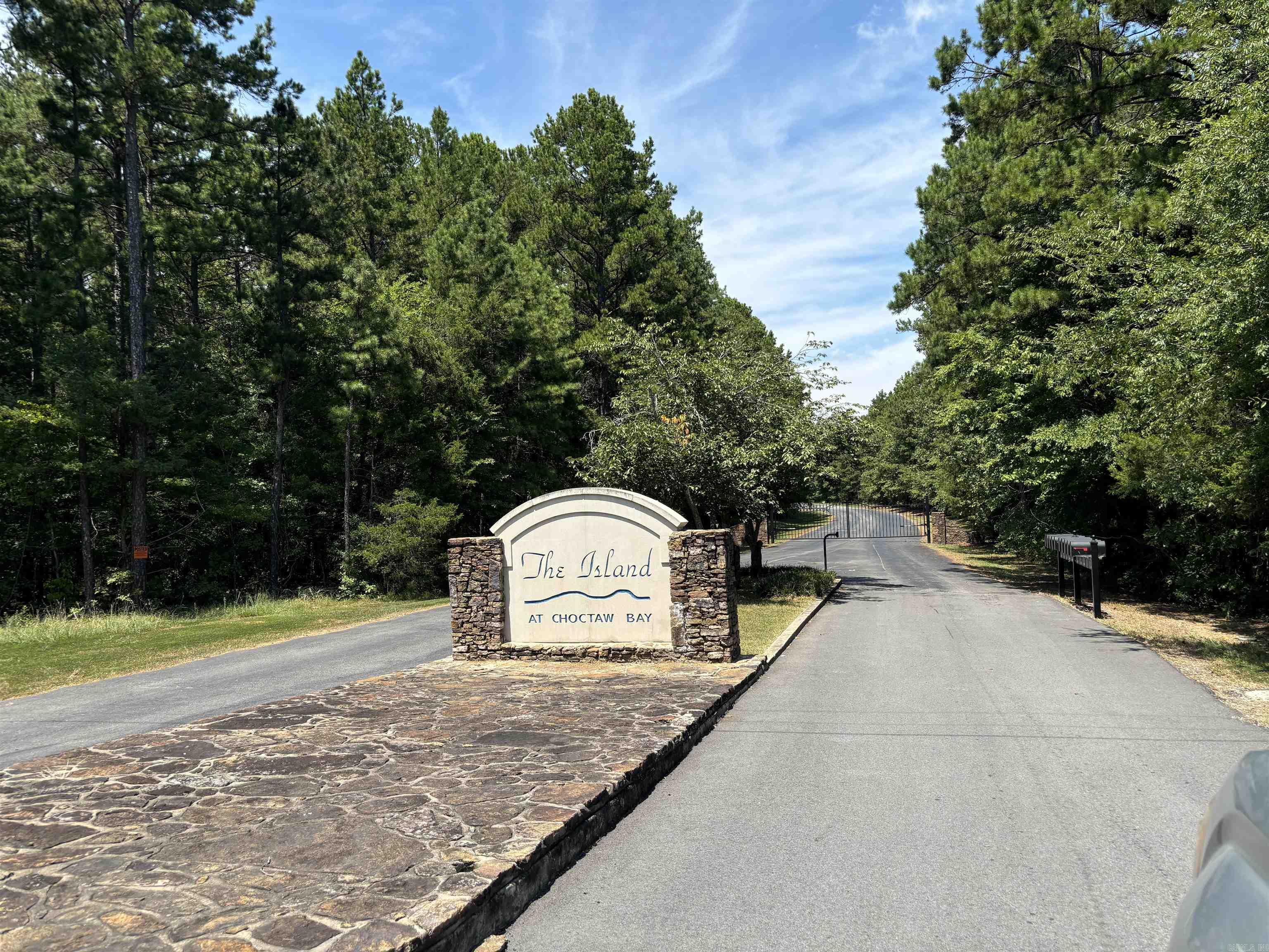 LARGE 2+ ACRES in a Beautiful Gated Community! Come and build your dream home in the gorgeous Island at Choctaw Bay. Call today!!!