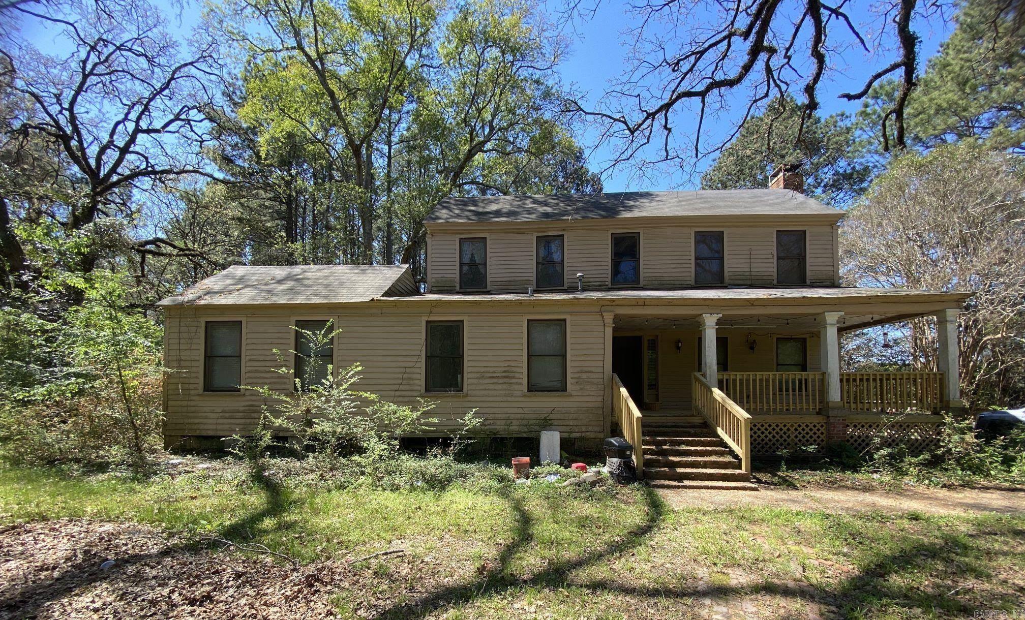 The Joel Smith House is a historic house at the County Route 5 in rural Union County, Arkansas. Built c.?1840, this two-story vernacular I-house was the home of Joel Smith, one of the first white settlers of Union County. The house is a rare surviving early example of a typical colonial-style house with matching shed-roof side porches. The property is also thought likely to yield archaeological finds useful in assessing and understanding frontier life in the area.  The house was listed on the National Register of Historic Places in 1990.