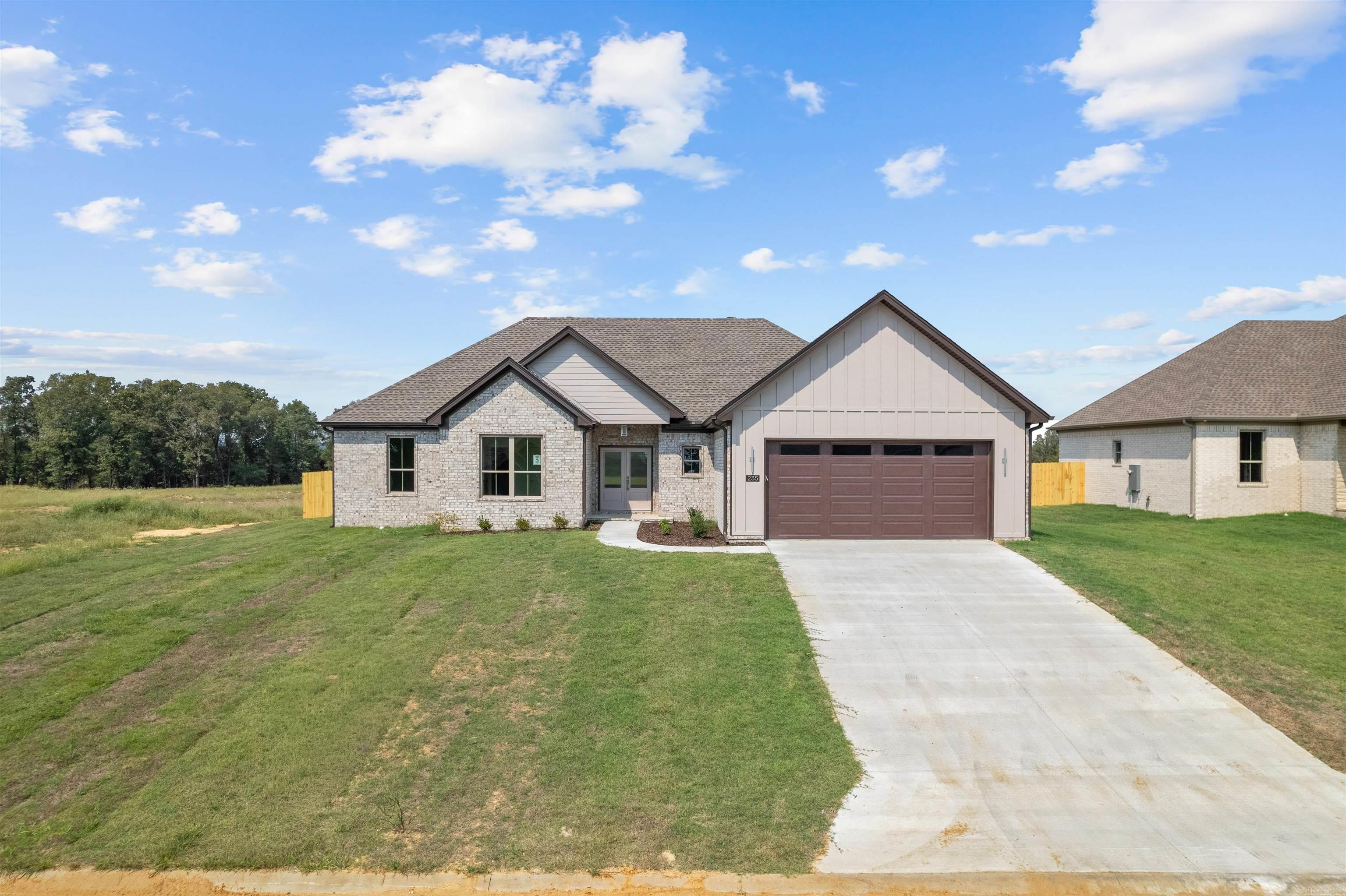 Welcome to Hidden Valley Estates in Beebe, AR!  This brand-new 4 bedroom, 2 bathroom home offers ~2,109 sq ft of thoughtfully designed living space with a split floor plan and open-concept layout perfect for modern living. The kitchen flows seamlessly into the living area—ideal for entertaining or keeping everyone connected.  Step out back and enjoy a serene pond backdrop, giving you peaceful views right from your covered patio. The primary suite is privately tucked away and features a spacious bath and walk-n closet. Secondary bedrooms are generously sized, offering plenty of flexibility for family, guests, or a home office.  Located in Beebe’s sought-after Hidden Valley Estates, this home offers quick access to Hwy 67/167 for an easy commute to Little Rock, Searcy, or Cabot. You’ll love being just minutes from ASU-Beebe, Beebe City Park, and the community pond.  Brand-new construction—low maintenance, energy-efficient living Open concept + split floor plan Pond view lot in a growing neighborhood Convenient location near schools, shopping, & recreation **Builder is installing a 6 ft pine privacy fence at no additional cost.