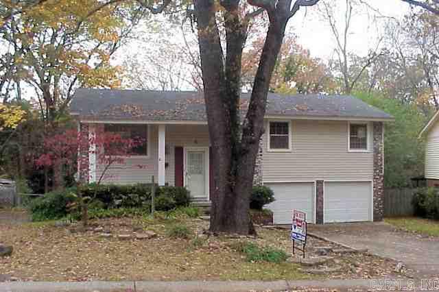 This is a rental in WLR * Kitchen counters/flooring/etc are updated since these photos to faux granite * Master Bathroom remodeled *  Great space with flexibility! Split foyer plan has 3 BR + 2BA up with LR and spacious Kitchen/Dining area.  Down is Gameroom/Den + 4th BR and 1/2 bath.  Large double garage * tree shaded and fenced back yard * quiet location convenient to all of WLR and I-430.