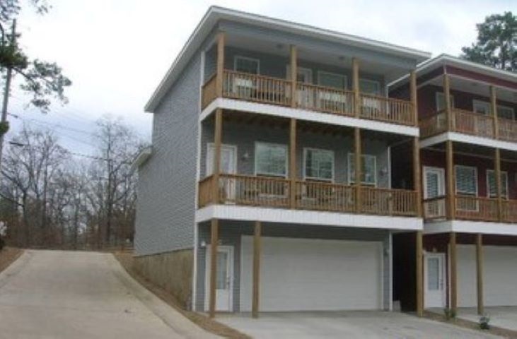 Great permanent home, weekender, or investment property. Updated with new paint, luxury vinyl wood look flooring in 2019! Views of Lake Hamilton on covered porch. Kitchen open to living and dining area. Large master bed room with patio. Lakeside School District. . Solid rental history, both short and long term rentals. This is a private six home community with private boat ramp and community boardwalk. Oversized garage to store your boat or other water toys! Nightly rentals allowed