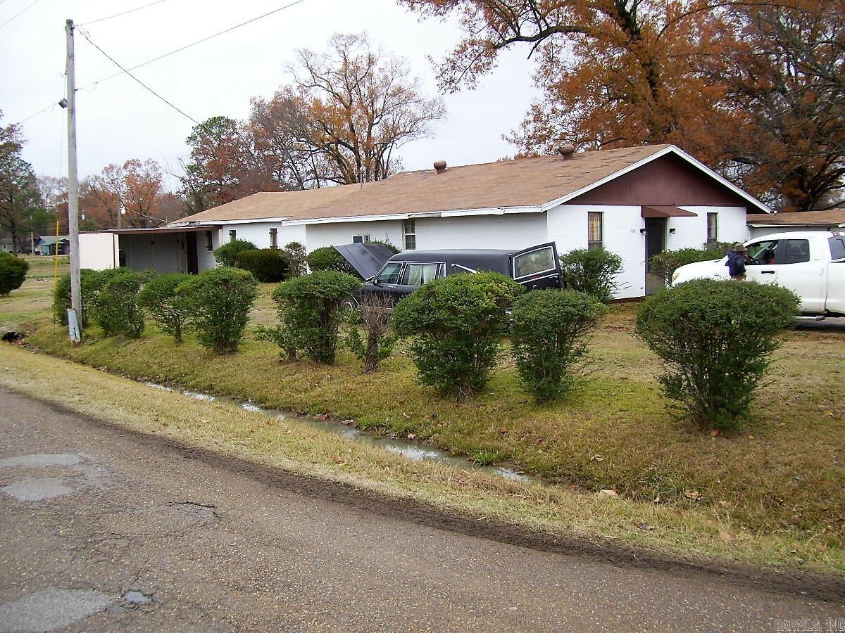 THE OWNER IS RETIRING AND HAS DECIDED TO SELL HIS PROPERTY. IT HAS BEEN USED AS A FUNERAL HOME AND CAN BE CONVERTED INTO ANY TYPE OF BUSINESS. WITH OVER 2,400 FEET UNDER ROOF AND SITTING ON 3 BIG CORNER LOTS. IF YOU ARE LOOKING FOR A GOOD COMMERCIAL LOCATION, YOU WILL LIKE THIS ONE.