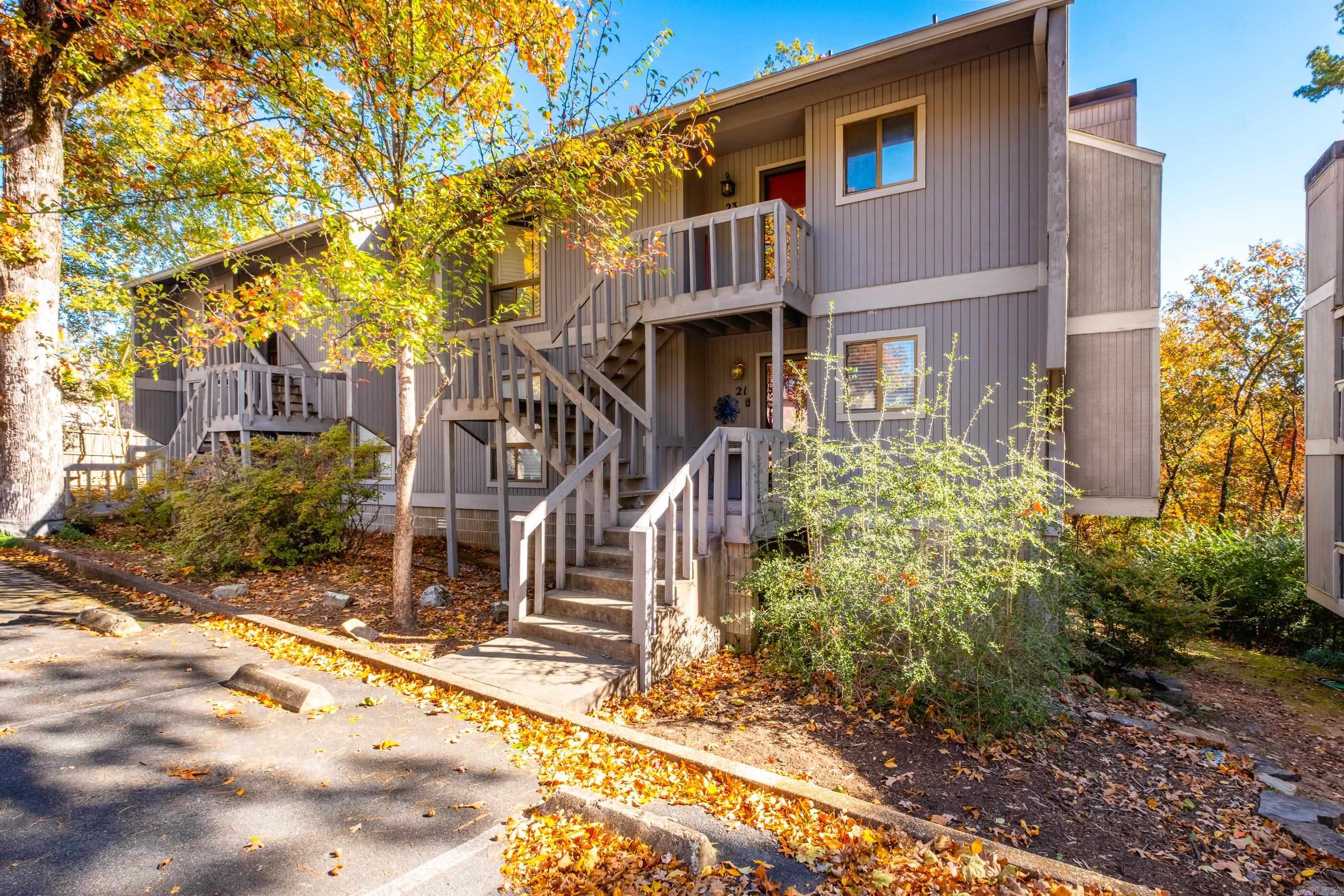 Beautifully Updated Condo Backing to Peaceful Woods. Located within the highly desirable Forest Park Elementary, Pulaski Heights Middle, and Central High School zones. Easy commute to UAMS, Bowen Law School, and Lyon Dental School.  Enjoy low-maintenance living in this move-in-ready 2-bedroom, 2-bathroom condo perfectly situated on the ground floor with a private, wooded view out back. The home features new luxury vinyl plank flooring throughout and fresh interior paint, creating a bright and inviting feel from the moment you step inside.  Relax on the covered back deck overlooking the wooded landscape. A climate-controlled 14x8 storage room is located just beneath the unit—ideal for bikes, tools, or seasonal items.  The seller is offering to pay the first 6 mo of POA dues as part of an acceptable offer. The POA provides extensive amenities and maintenance, covering:  Water, sewer, and trash removal  Common area electricity and exterior lighting  Grounds and lawn care  Swimming pool access  Maintenance of community property and exterior areas  This one-level unit offers easy accessibility, peaceful surroundings, and a worry-free lifestyle—just move in and enjoy!