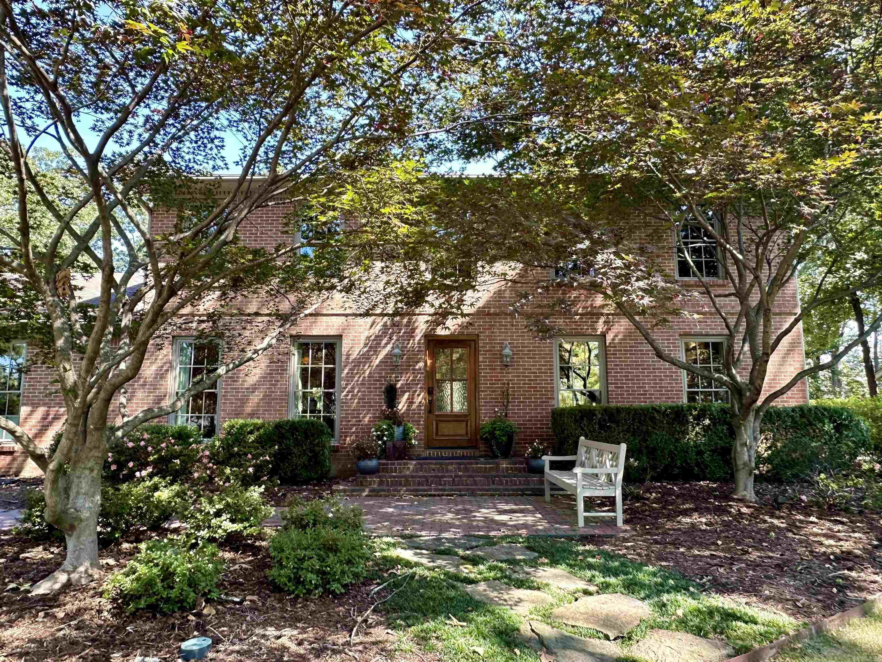 Stately Pleasant Valley home on large, beautiful lot.  Many updates throughout, huge primary bedroom suite on main level.